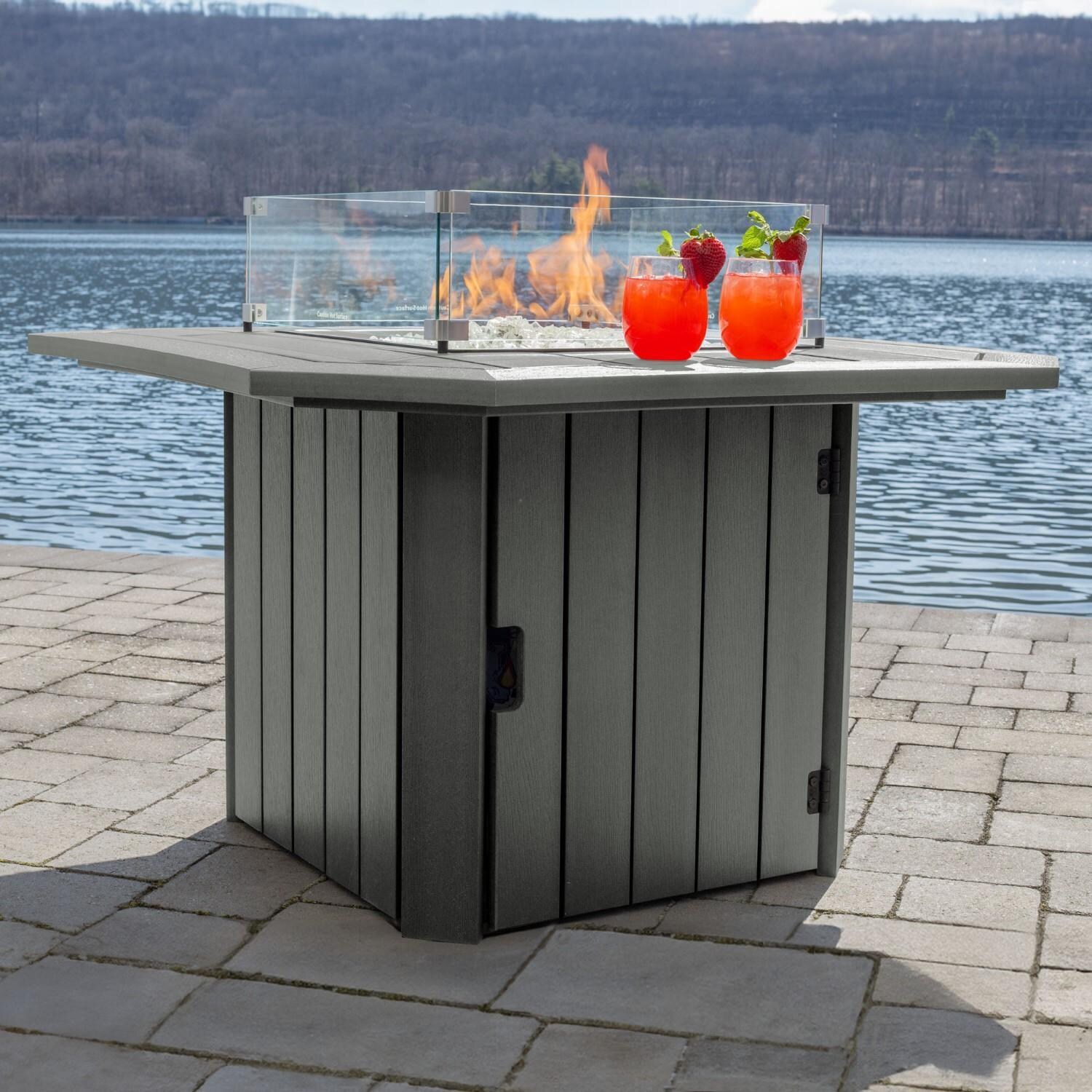 Harborview Octagonal Fire Pit Table in Coastal Teak by Lakeview Outdoor Designs - Side View - Lifestyle thumbnail