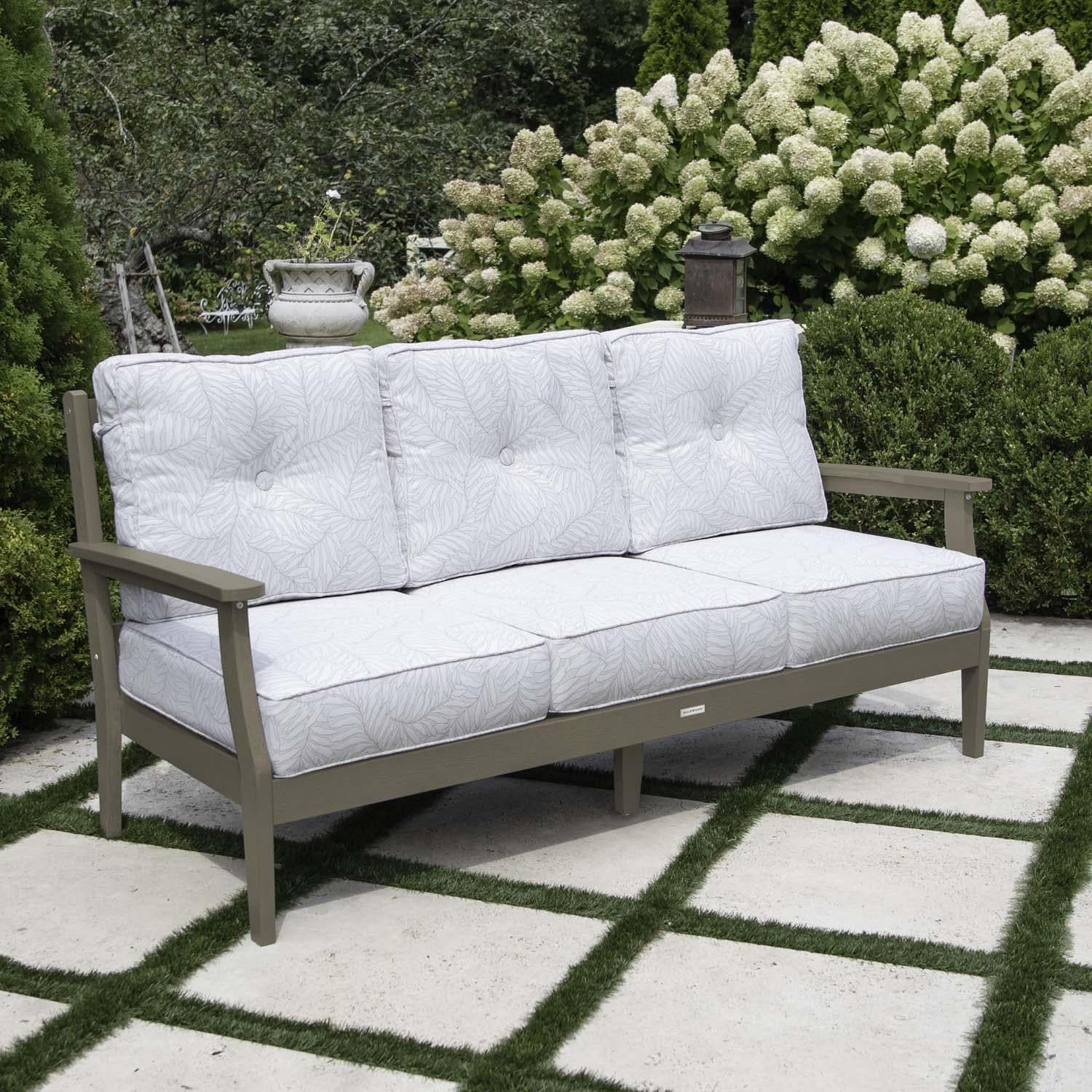Blushing Bay 3 Person Recycled Plastic Sofa in Lively Parchment/Woodland Brown by Lakeview Outdoor Designs - Left Angled - Lifestyle thumbnail