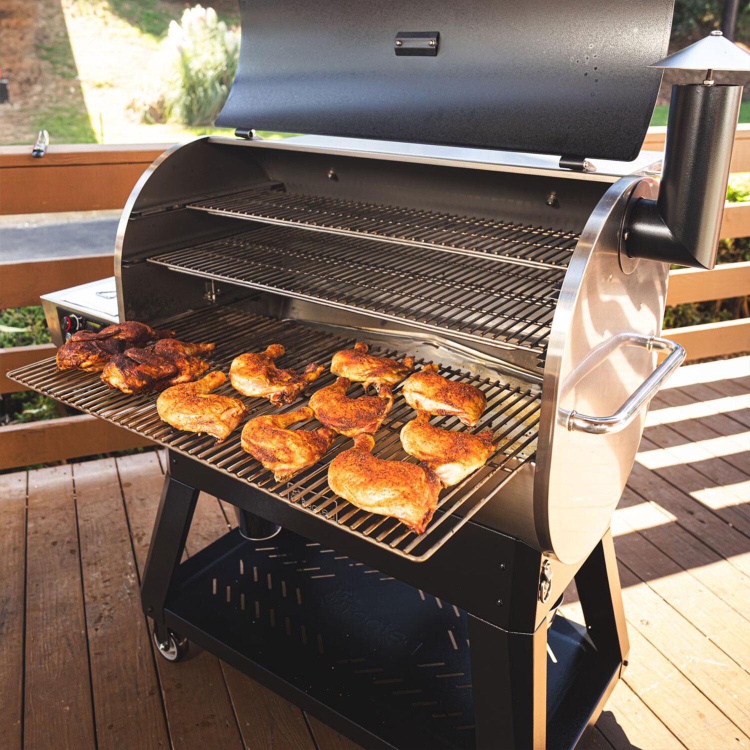 recteq RT-1600FS Flagship 1600 Wood Pellet Grill - Grilling Chicken on Grates - Lifestyle thumbnail