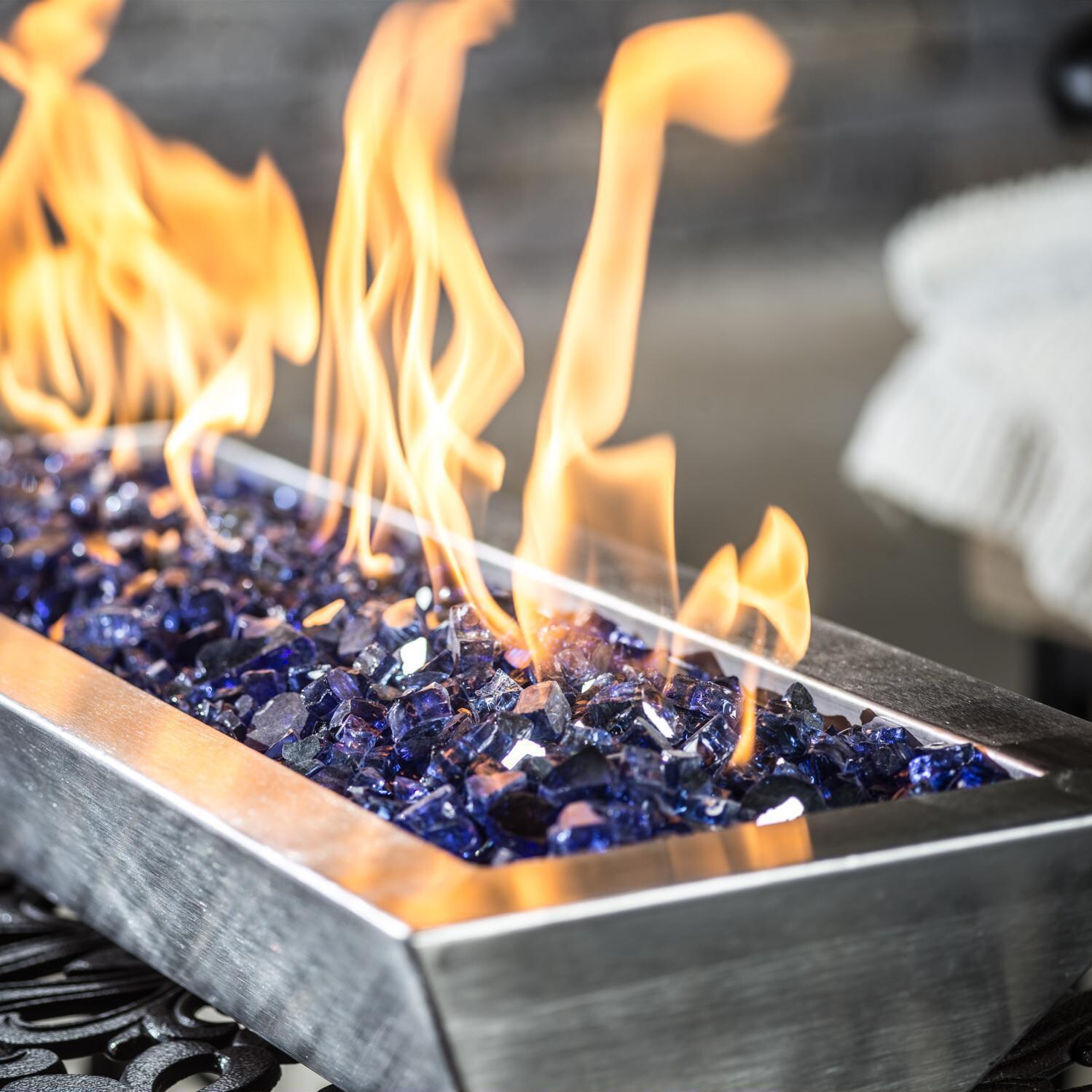 BBQGuys Signature Series Westfalen 18-Inch Table-Top Natural Gas Fire Pit - Stainless Steel - Angled - Shown with 1/2 inch Blue Jay Reflective Fire Glass thumbnail