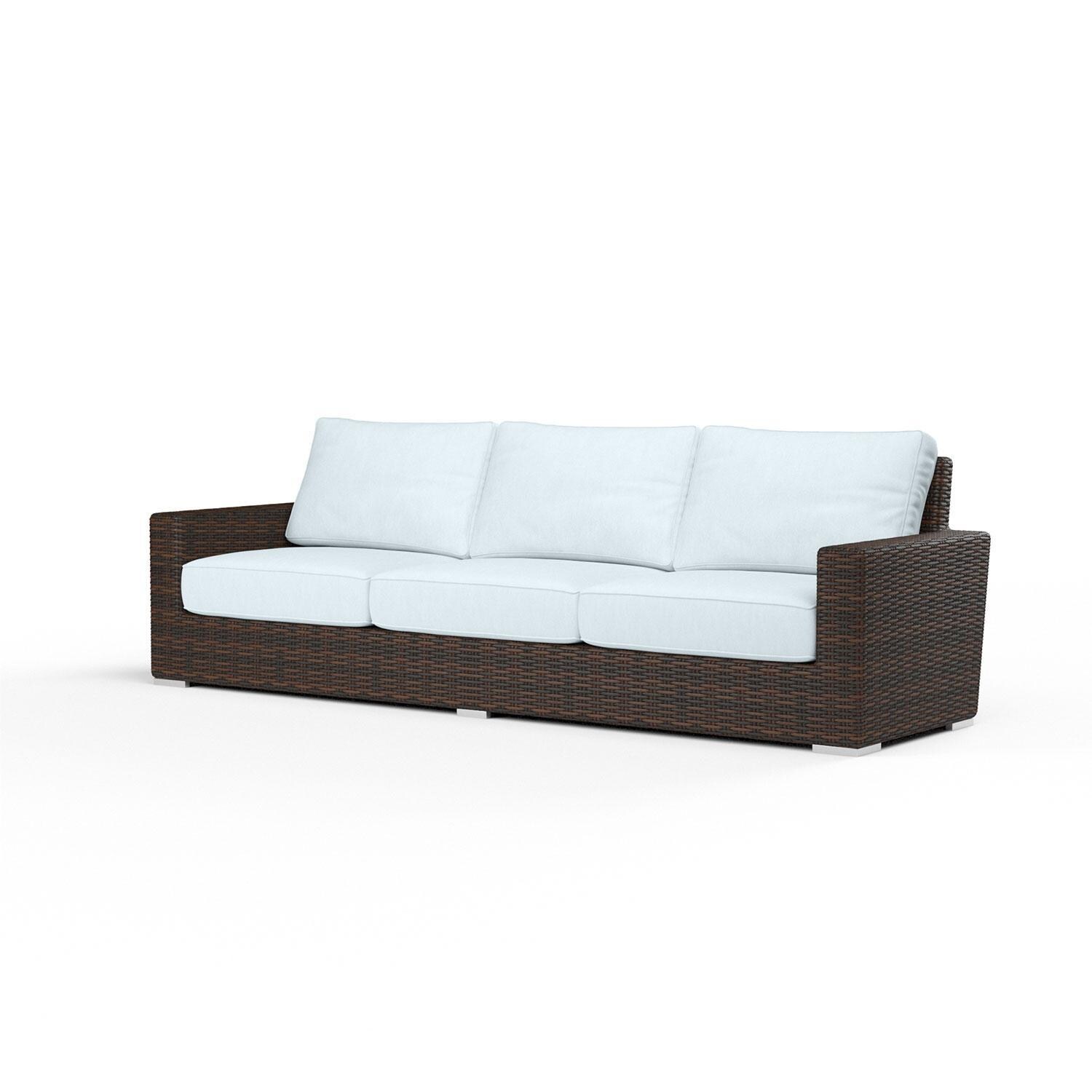 Montecito Wicker Patio Sofa in Canvas Skyline w/ Self Welt By Sunset West - Display - White Background thumbnail