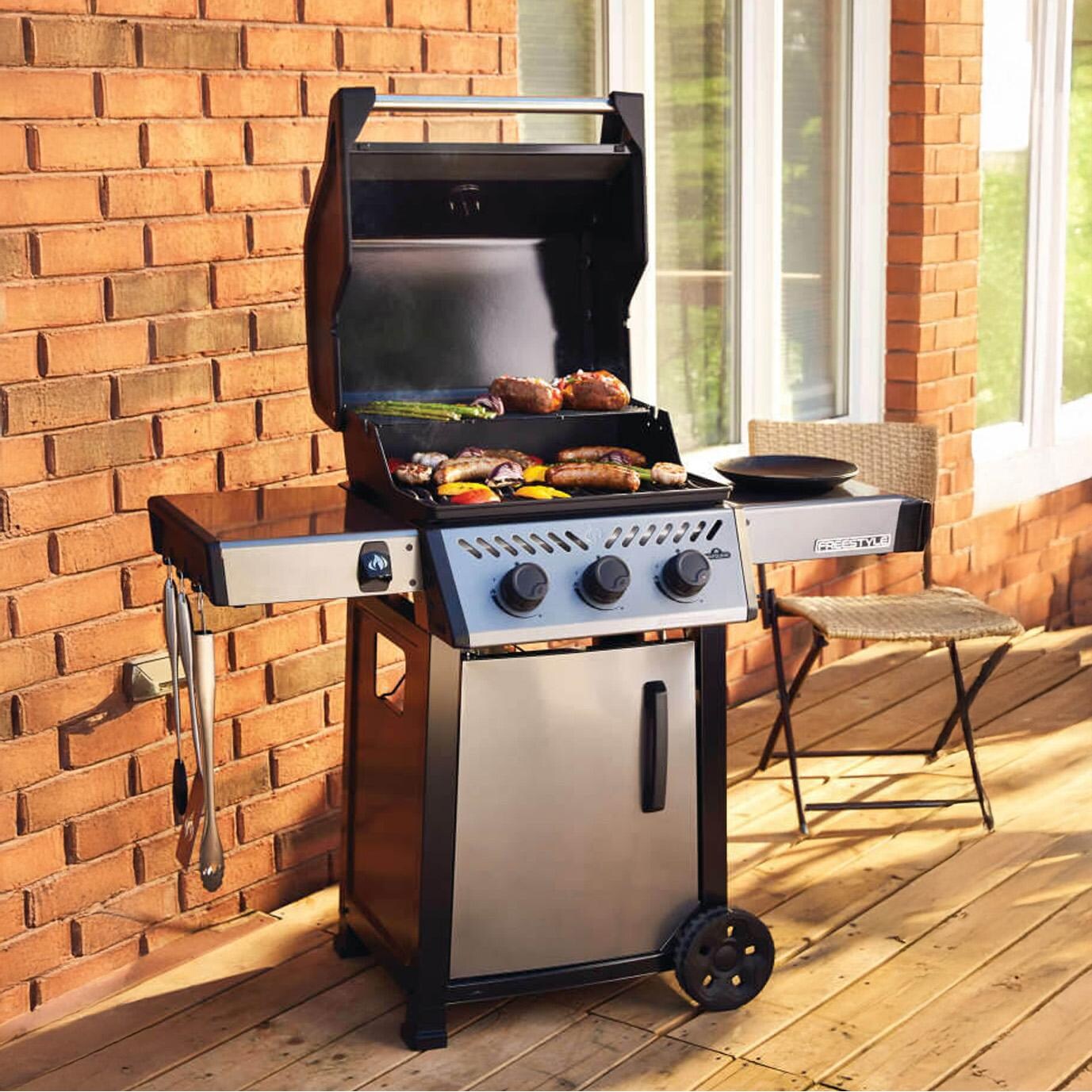 Napoleon F365DPGT Freestyle 365 3 Burner Propane Gas Grill - Graphite Grey - On Patio - Lifestyle thumbnail