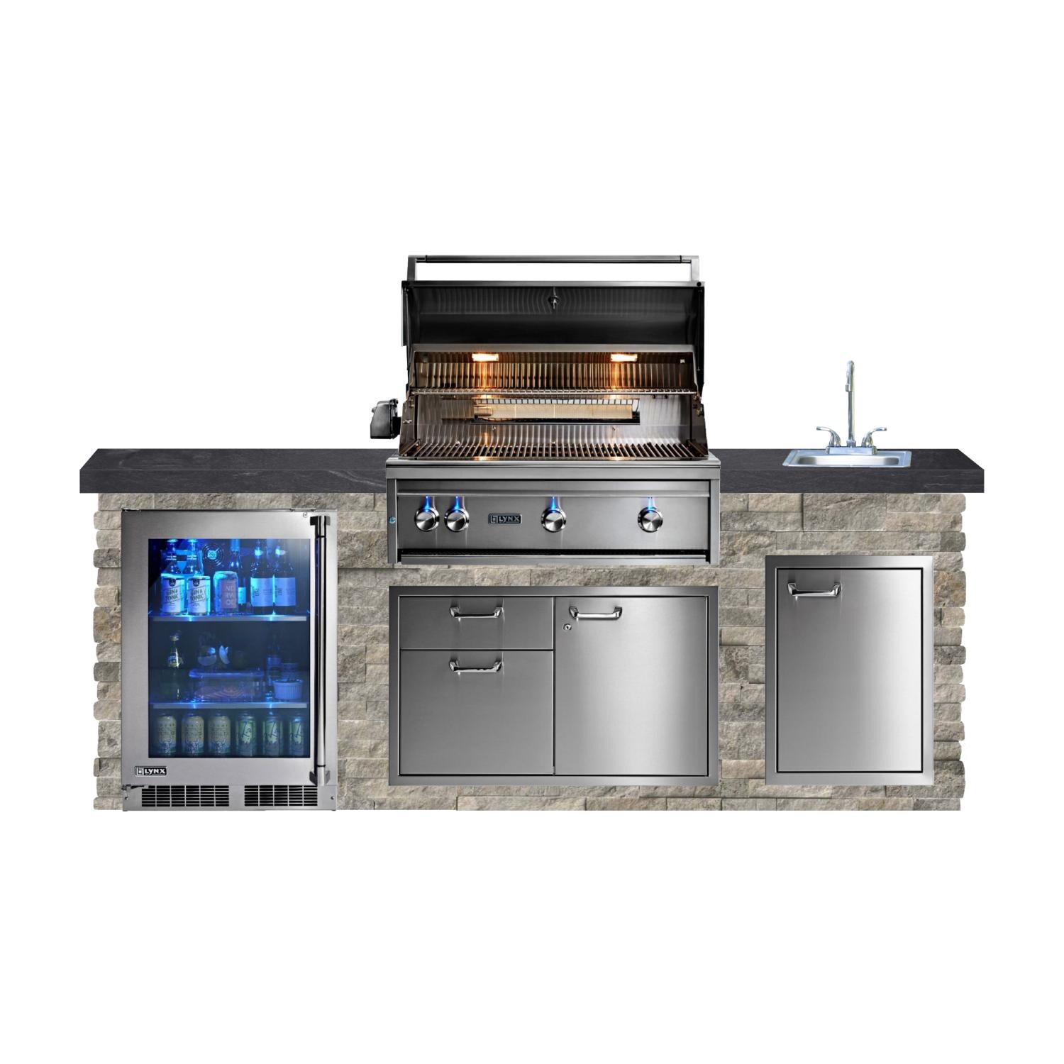 BBQGuys Signature 8ft Luxury Outdoor Kitchen w/ Lynx Professional 36-Inch Natural Gas Grill, Refrigerator & Sink - Silver Travertine Stone w/ Black Polished Granite - White Background thumbnail