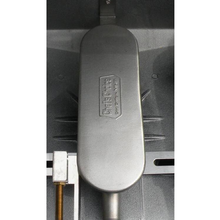 MHP Tri-Burn W3G4DD Freestanding Gas Grill With SearMagic Grids On In-Ground Post - Cast Oval Stainless Burner Close-Up thumbnail