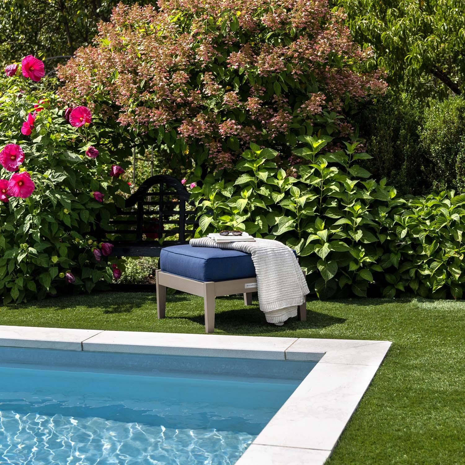 Blushing Bay Recycled Plastic Ottoman in Spectrum Indigo/Woodland Brown by Lakeview Outdoor Designs - By Pool - Lifestyle thumbnail