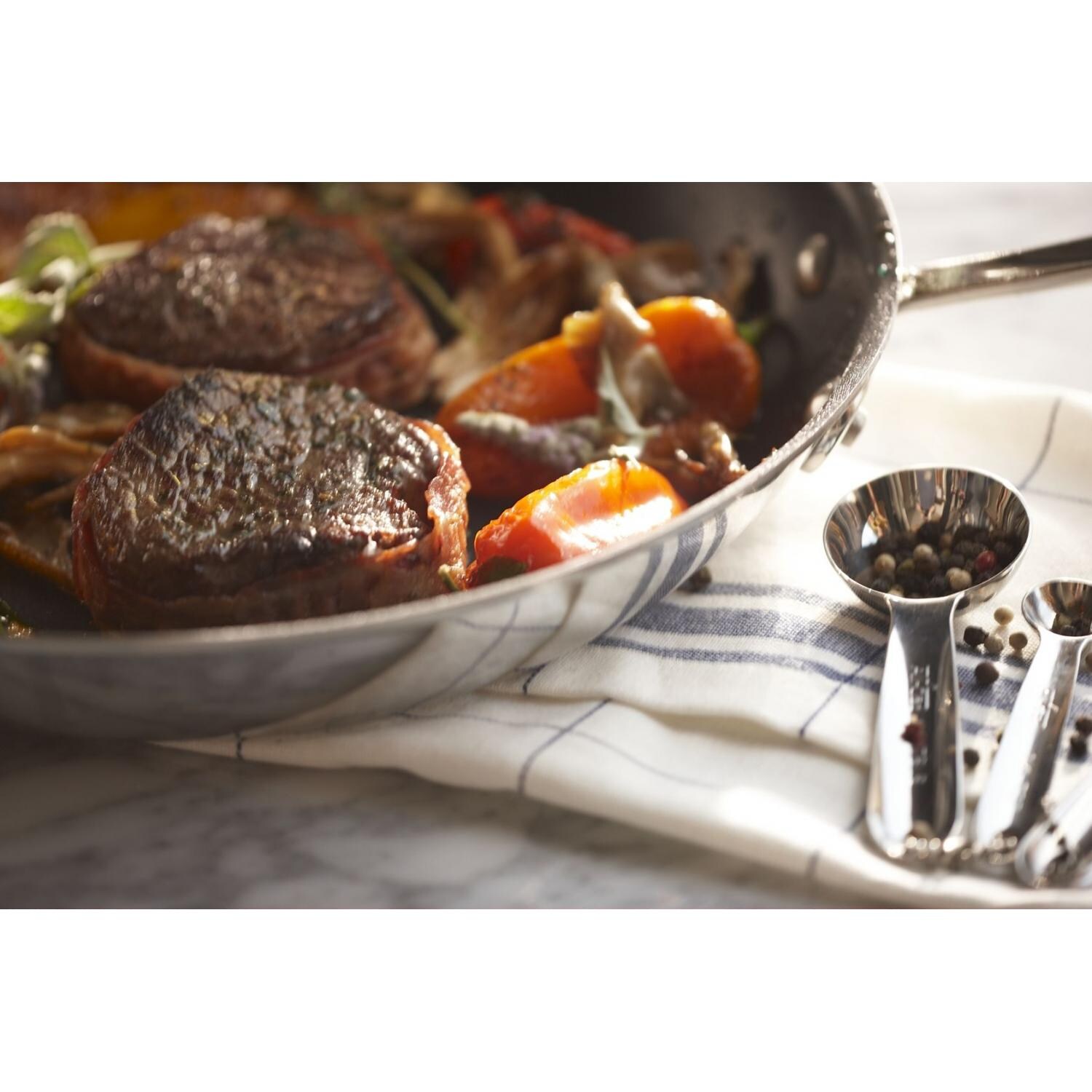 All-Clad Stainless 12-Inch Nonstick Fry Pan In Use thumbnail