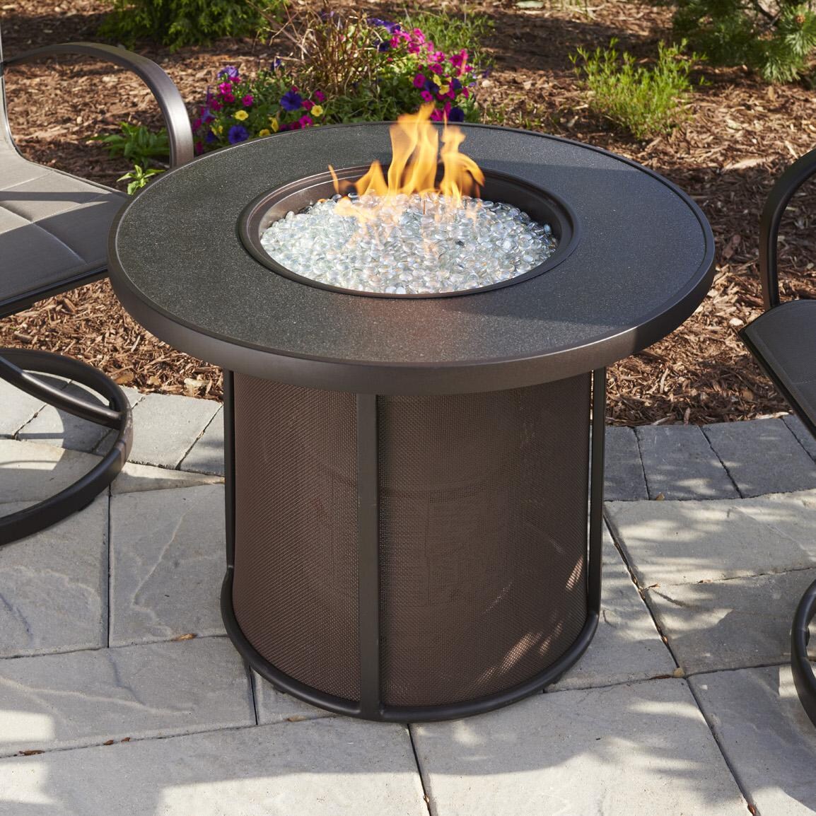 The Outdoor GreatRoom Company Stonefire Round Gas Fire Pit Table - Lifestyle thumbnail