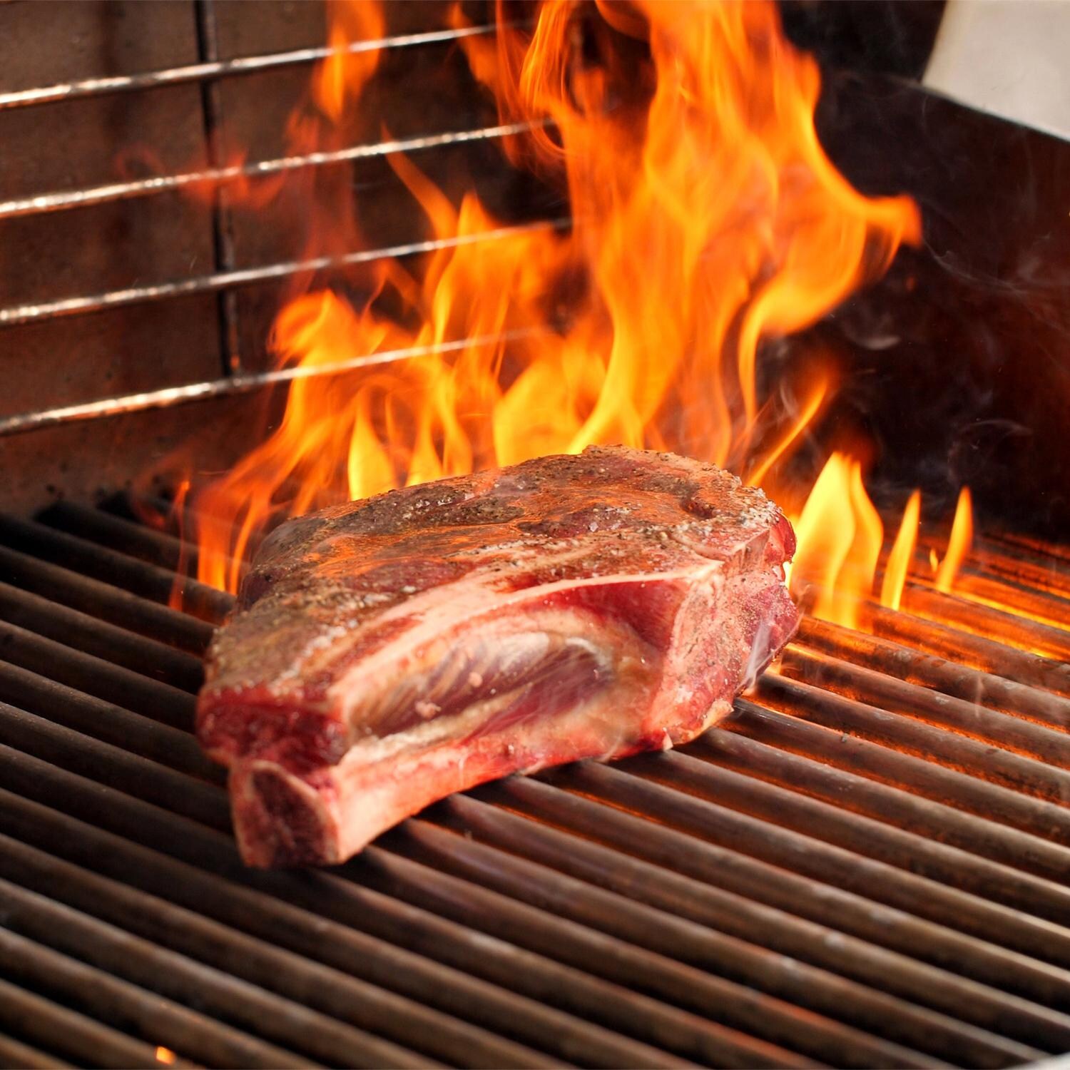 Weber Genesis II Gas Grill - Grilling Steak - Closeup thumbnail