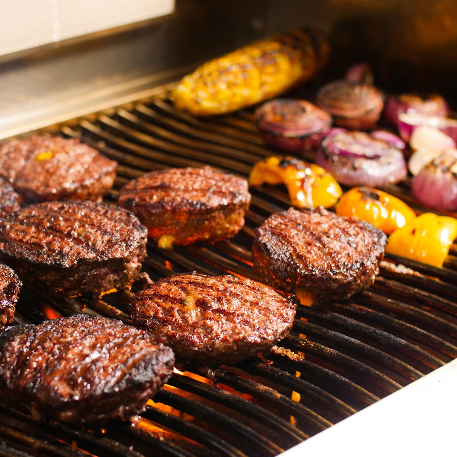 Napoleon LEX485RSIBPSS-1 LEX 485 Propane Gas Grill With Infrared Rear Burner And Infrared Side Burner - Grilling Burgers & Veggies On The Napoleon Wave Cooking Grids thumbnail