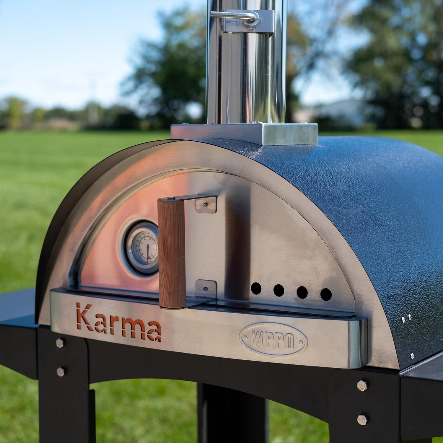 WPPO WKK-01S-WS-Black Karma 25-in Wood Fired Pizza Oven w/ Black Cart - Black - Angled View - Lifestyle thumbnail