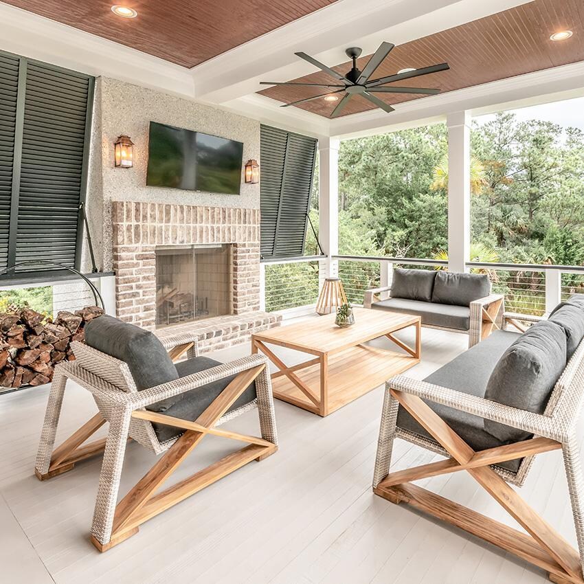 Teak + Table Caicos Sofa in Natural - Fireside (Carbon Cushions Shown) - Lifestyle thumbnail