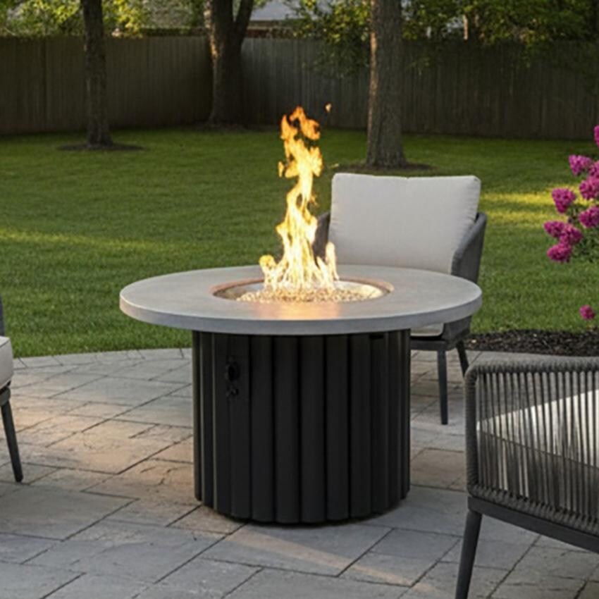 Reverie REVRBL-48-K-NG 48-in Round Aluminum Natural Gas Fire Pit Table w/ Relic Grey Supercast Top & Black Base (Ships Propane w/ Conversion Kit) - Up Close - Lifestyle thumbnail