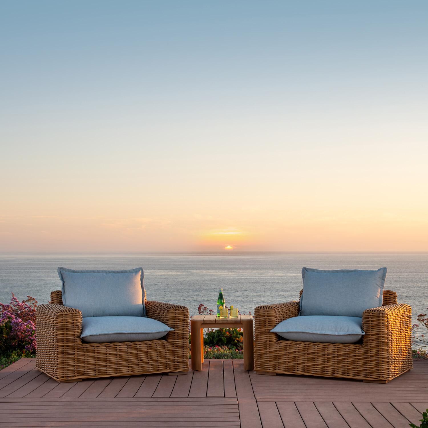 Playa Resin Wicker Oversized Swivel Club Chair in Medium Wood/Soothe Pearl by Sunset West - Sunset - Lifestyle thumbnail