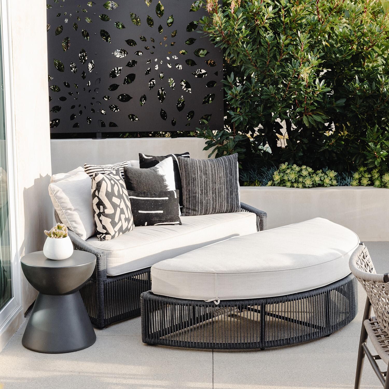Sunset West - 6203-DRET - Bazaar 17-Inch Round GFRC Patio End Table - Dark Grey - On Patio - Lifestyle thumbnail