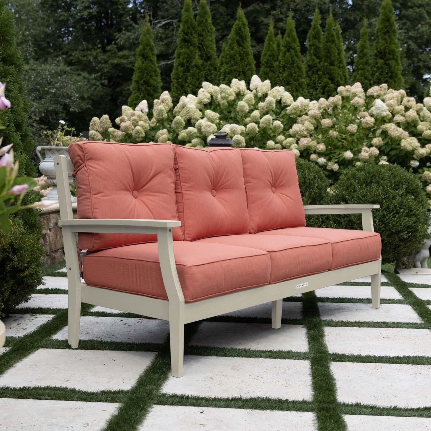 Blushing Bay 3 Person Recycled Plastic Sofa in Canvas Persimmon/Whitewash by Lakeview Outdoor Designs - Side View - Lifestyle thumbnail