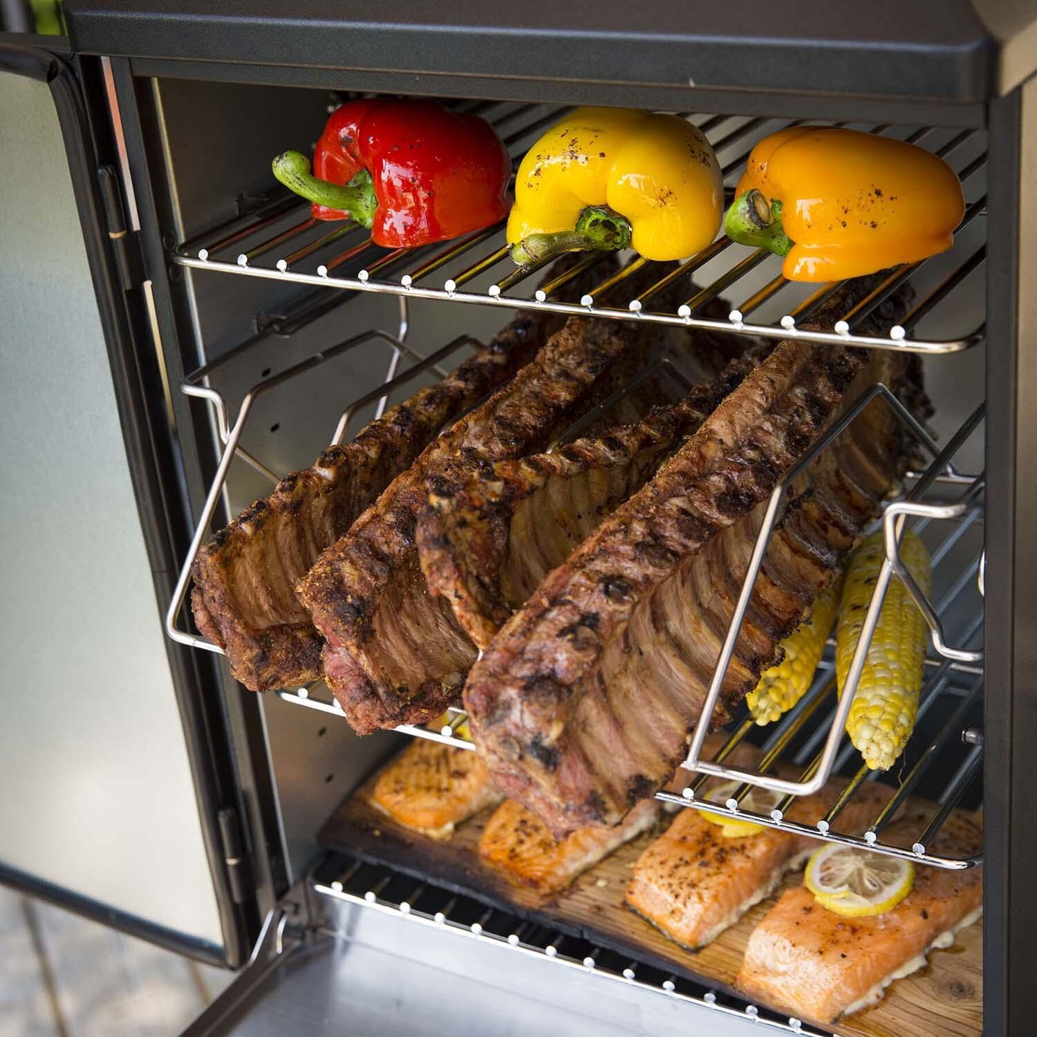 Broil King 28-Inch Smoke Vertical Propane Gas Smoker - Black - Ribs - Lifestyle thumbnail