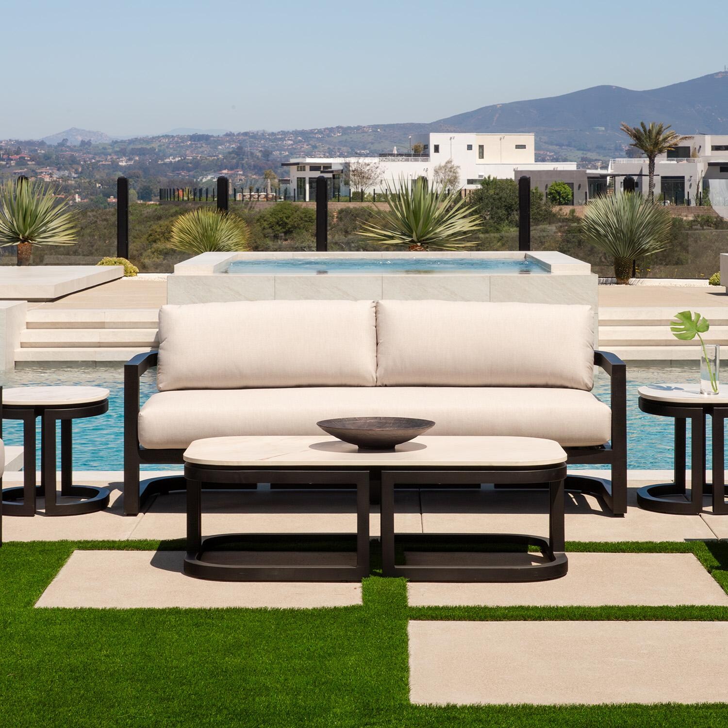 Malibu 60 Inch Black Aluminum Coffee Table by Sunset West - Shown as Set - Lifestyle thumbnail