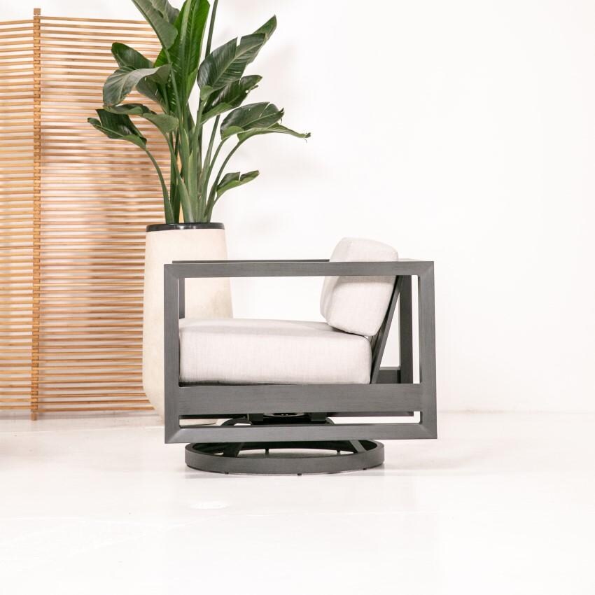 Redondo Aluminum Swivel Club Chair w/ No Welt in Slate/Canvas Skyline by Sunset West - Side View - Lifestyle