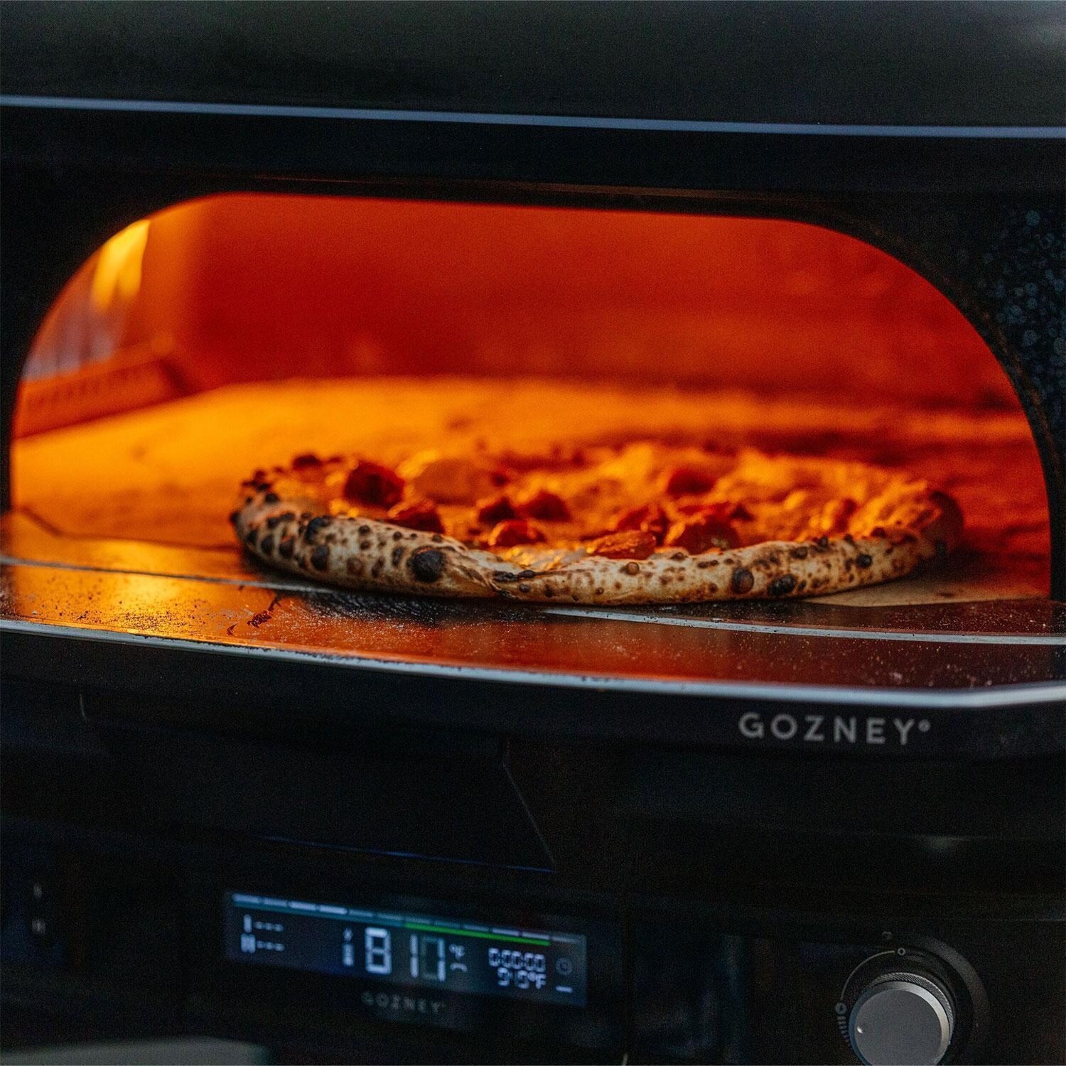 Gozney GMNOBUS1626 Off Black Dome Gen 2 Natural Gas Pizza Oven Bundle - Pizza Baking - Lifestyle thumbnail