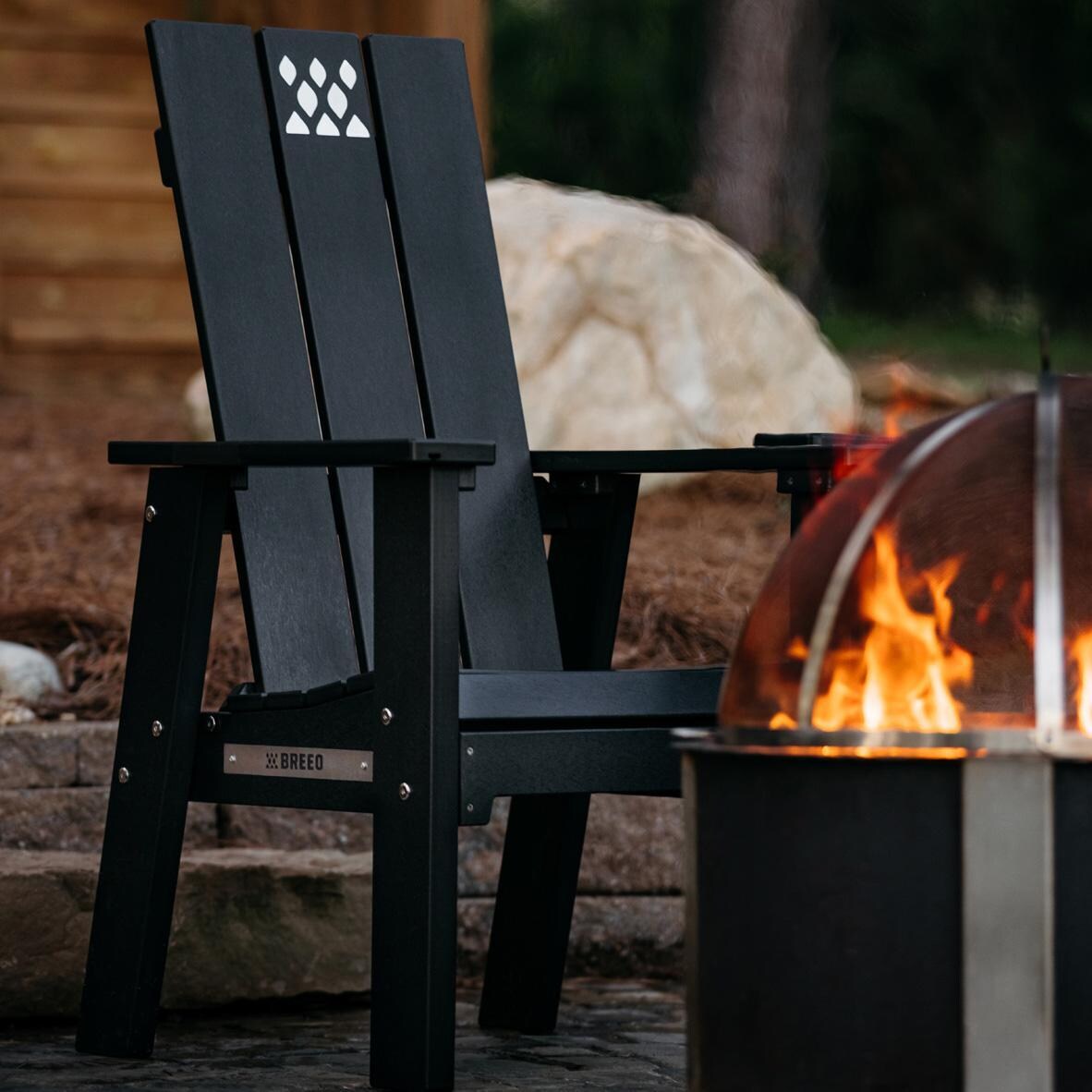 Breeo BR-X-BKPYCR X Series Wood Chair in Black - By the Fire - Lifestyle thumbnail