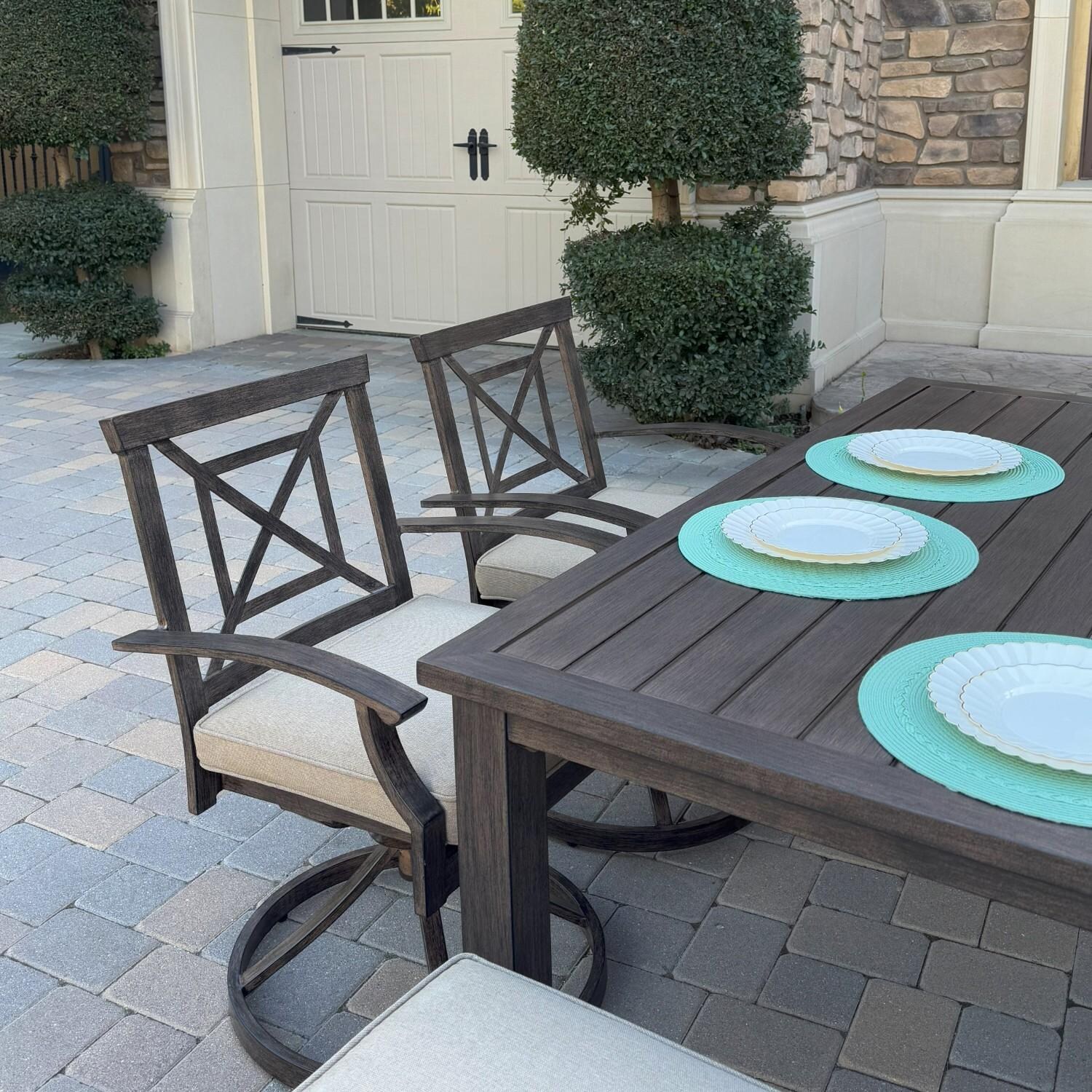 Atlantis 7 Pc Aluminum Dining Set w/ 4 Swivel Rocker Dining Arm Chairs & 2 Two Person Benches in Walnut/Beige by Darlee - Chairs At Table - Lifestyle thumbnail