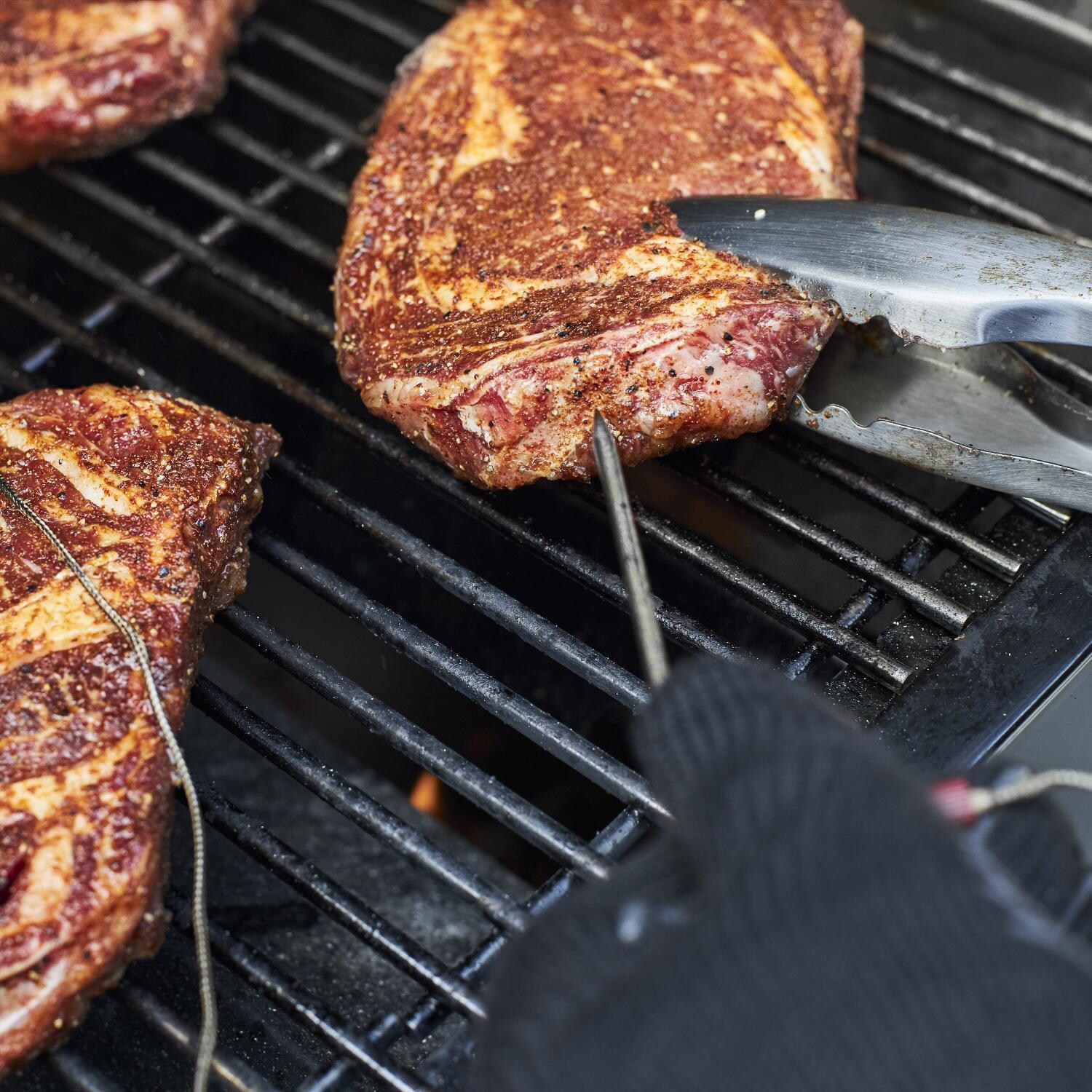 Weber 22510201 SmokeFire EX4 Gen 2 24-Inch Wi-Fi Enabled Wood Fired Pellet Grill - Meat Probe In Use - Detail thumbnail