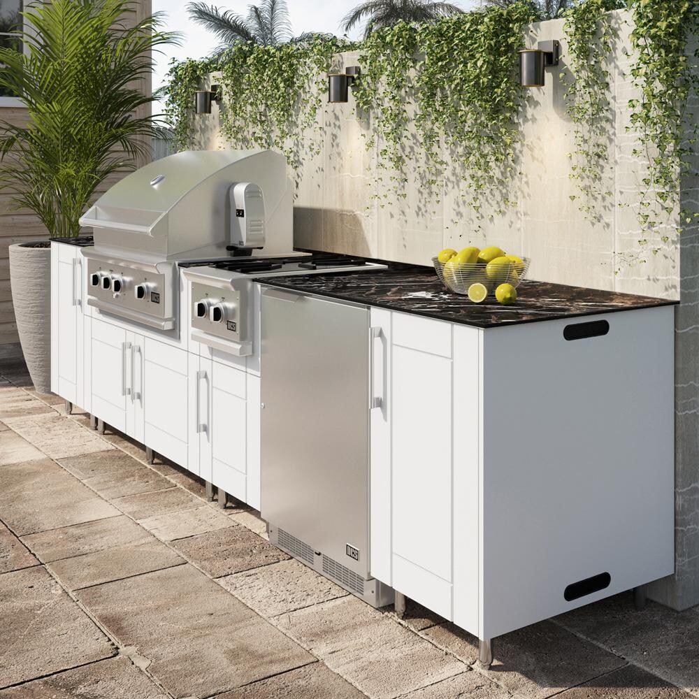 WeatherStrong Nassau 10 1/2 Ft Outdoor Kitchen Island w/ Lynx Natural Gas Grill, Side Burner & Refrigerator in Shell White/Midnight Ice - On Patio - Lifestyle thumbnail