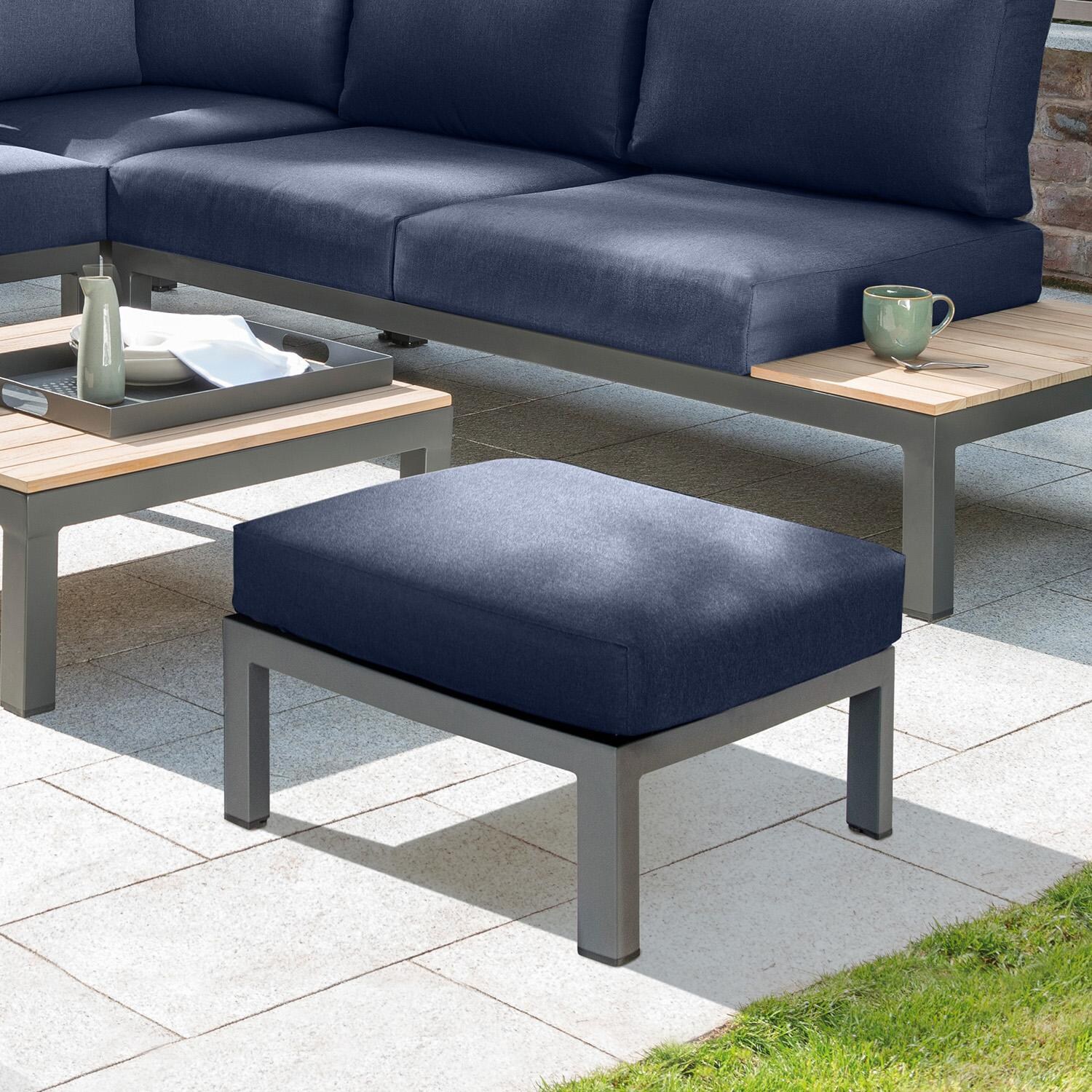 Elba Aluminum Ottoman in Charcoal / Spectrum Indigo - On Patio - Lifestyle thumbnail