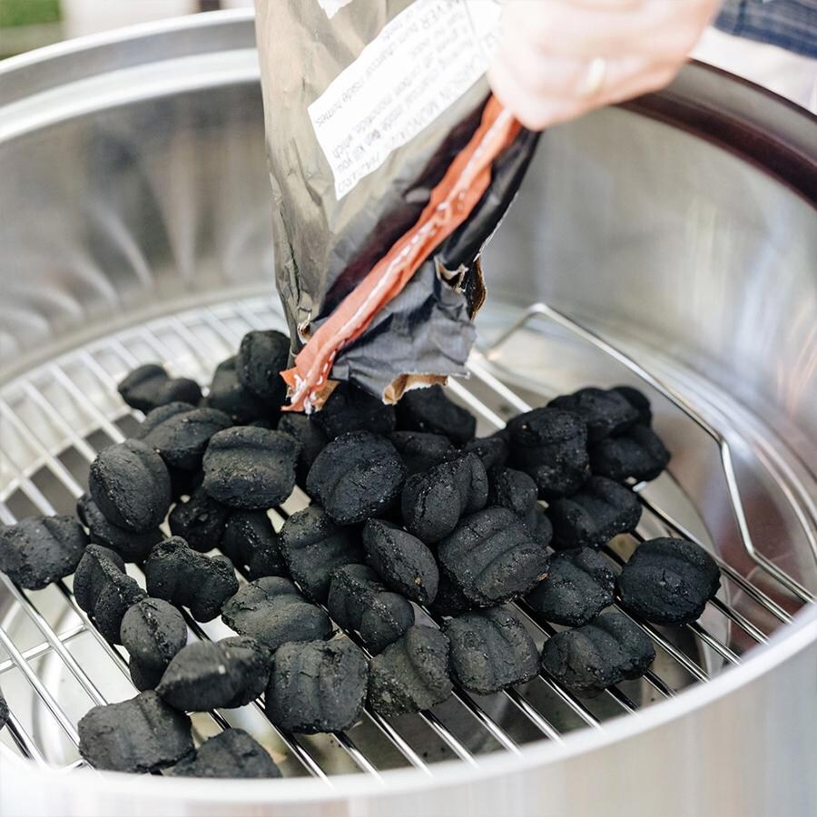 Solo Stove ULT-SSGRILL-22 Ultimate Grill Bundle - Pouring Charcoal In thumbnail