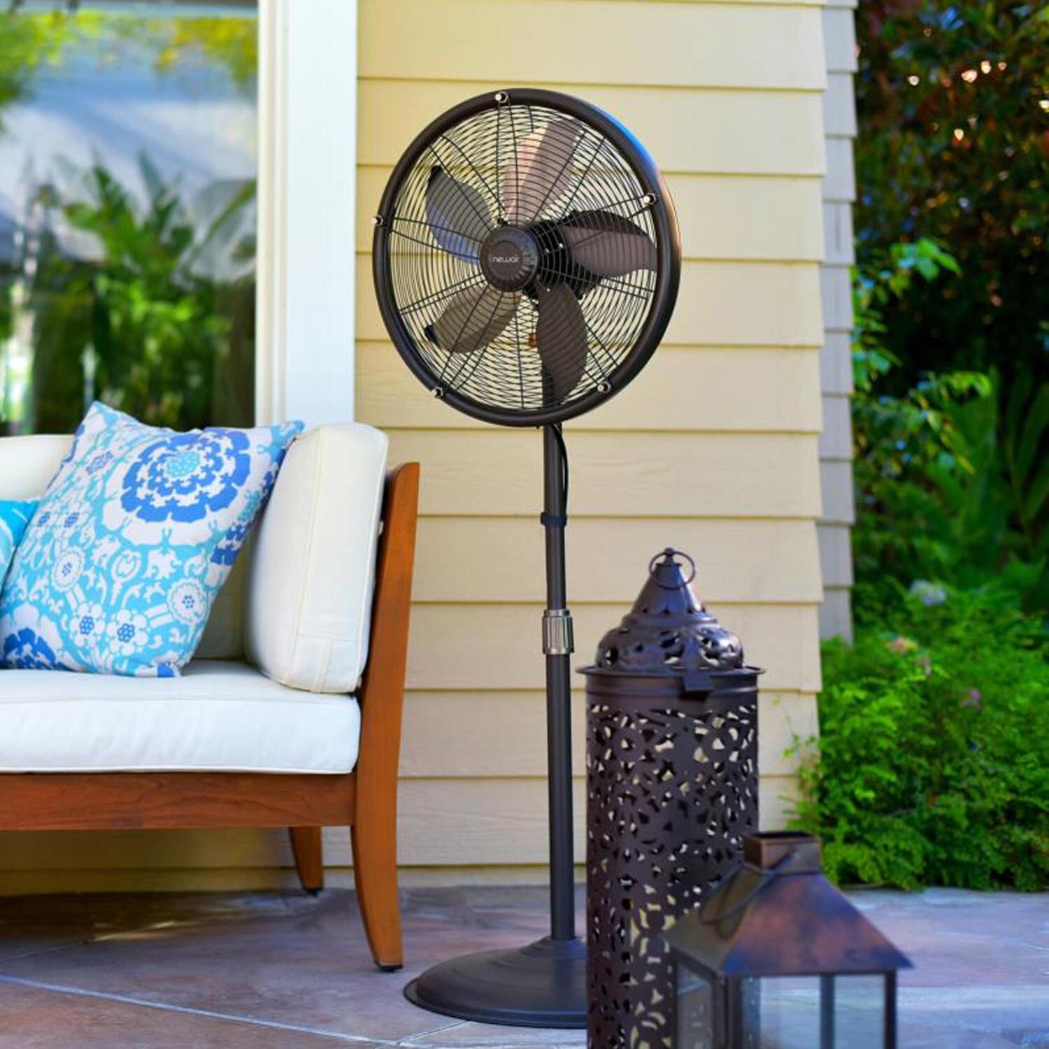 NewAir AF-600 18-in Misting & Oscillating Pedestal Fan for Indoor & Outdoor w/ Adjustable Height & Head Tilt - 2800 CFM - On Patio Mid Distance - Lifestyle thumbnail