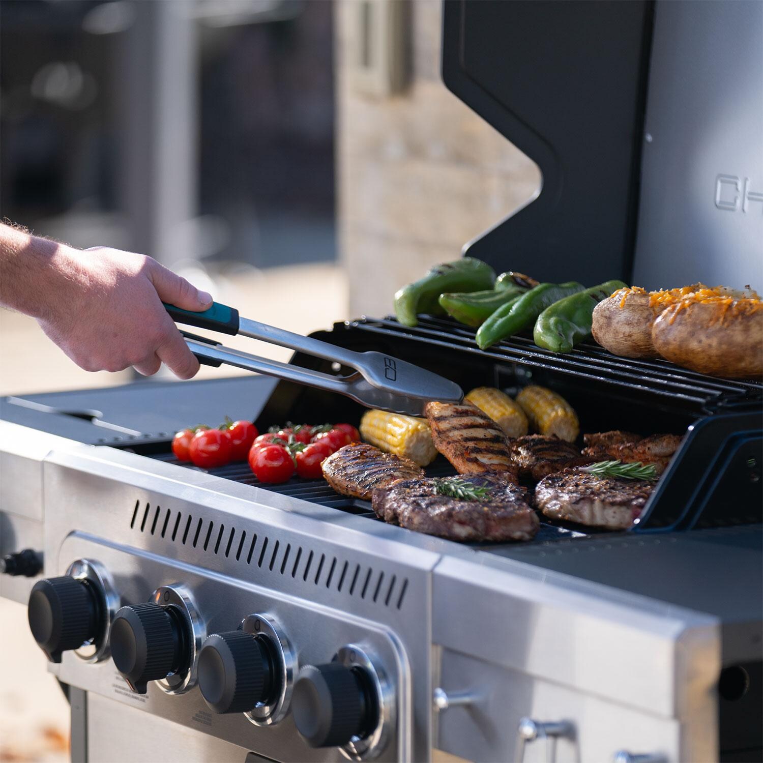 Charbroil 463348725 Performance Series 4-Burner Propane Grill Cabinet W/ Side Burner - Stainless Steel - Grilling Food - Lifestyle thumbnail