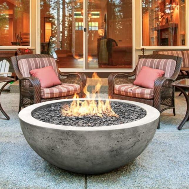 Moderno 4 48-in Round Glass Fiber Reinforced Concrete Natural Gas Fire Bowl in Pewter by Prism Hardscapes - On Patio - Lifestyle thumbnail