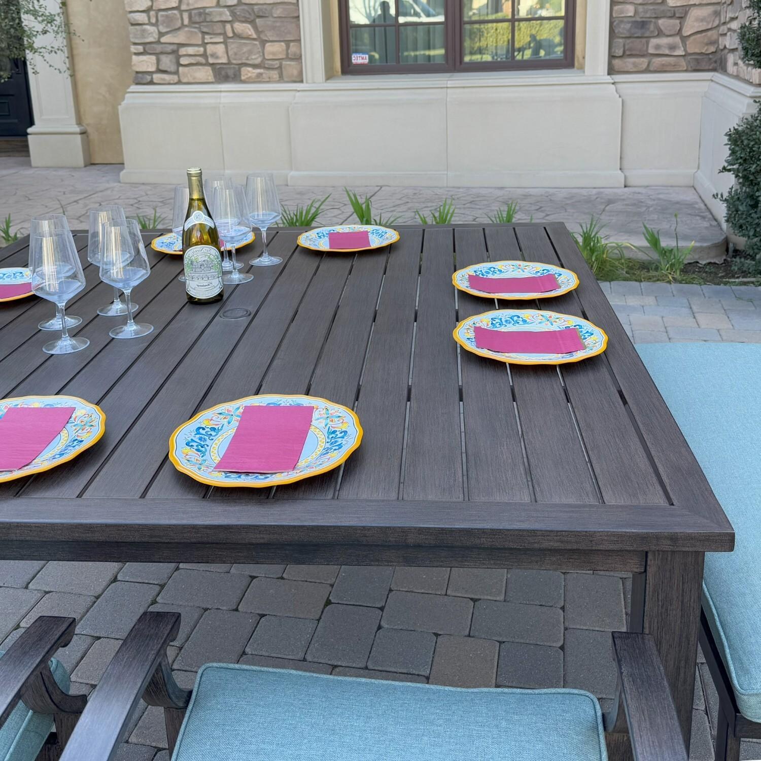 Atlantis 6 Pc Aluminum Dining Set w/ 2 Swivel Rocker Dining Arm Chairs & 3 Two Person Benches in Walnut/Spa by Darlee - Table Close-up - Lifestyle thumbnail