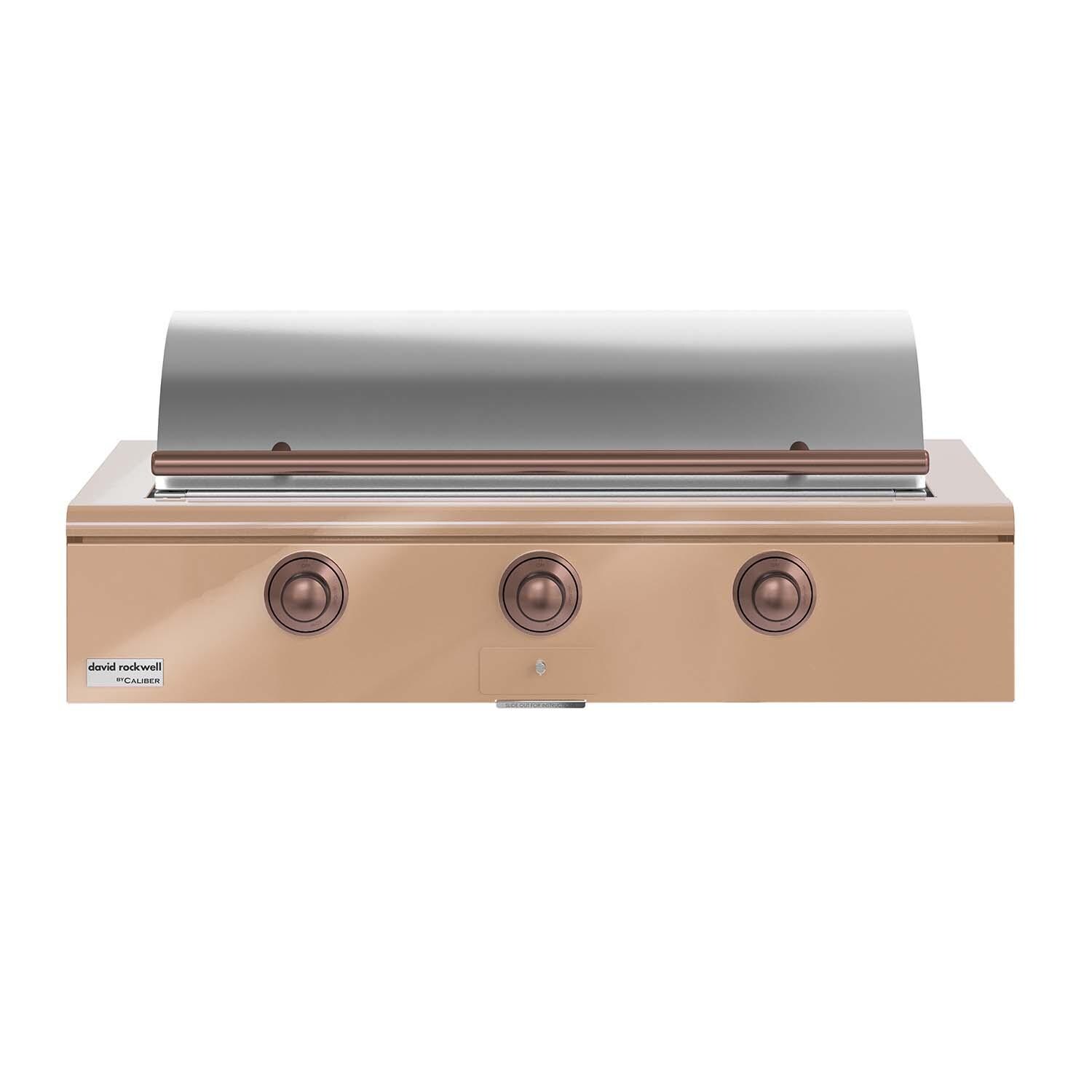 Caliber CRG-48BN00-A-179-H03 48-in Natural Gas Built-In Rockwell Grill - Champagne w/ Copper Hardware - Lid Closed - White Background thumbnail