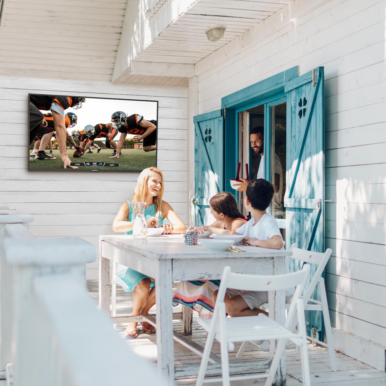 Peerless-AV WPTV753 Neptune 75-Inch Partial Sun Outdoor Smart TV - Family Dinner thumbnail