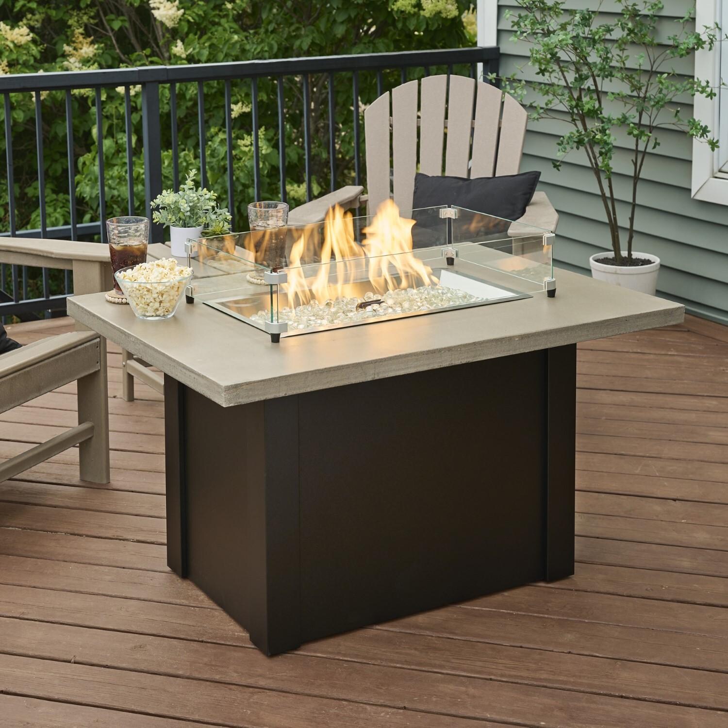 Havenwood 44 Inch Fire Pit Table W/ Pebble Grey Top & Black Base - Flames W/ Glass and Props - Lifestyle thumbnail