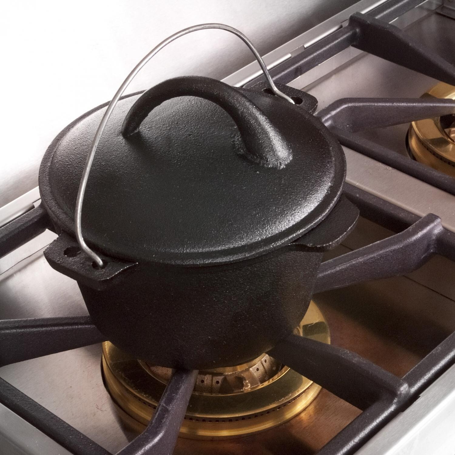 Cajun Cookware 1 Quart Seasoned Cast Iron Dutch Oven on Stove Top thumbnail