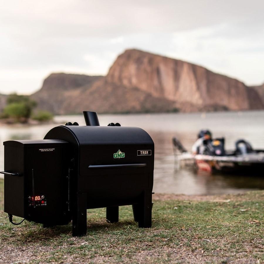 Green Mountain Grills Trek Prime 2.0 WiFi Pellet Grill - By Lake - Angled - Lifestyle thumbnail