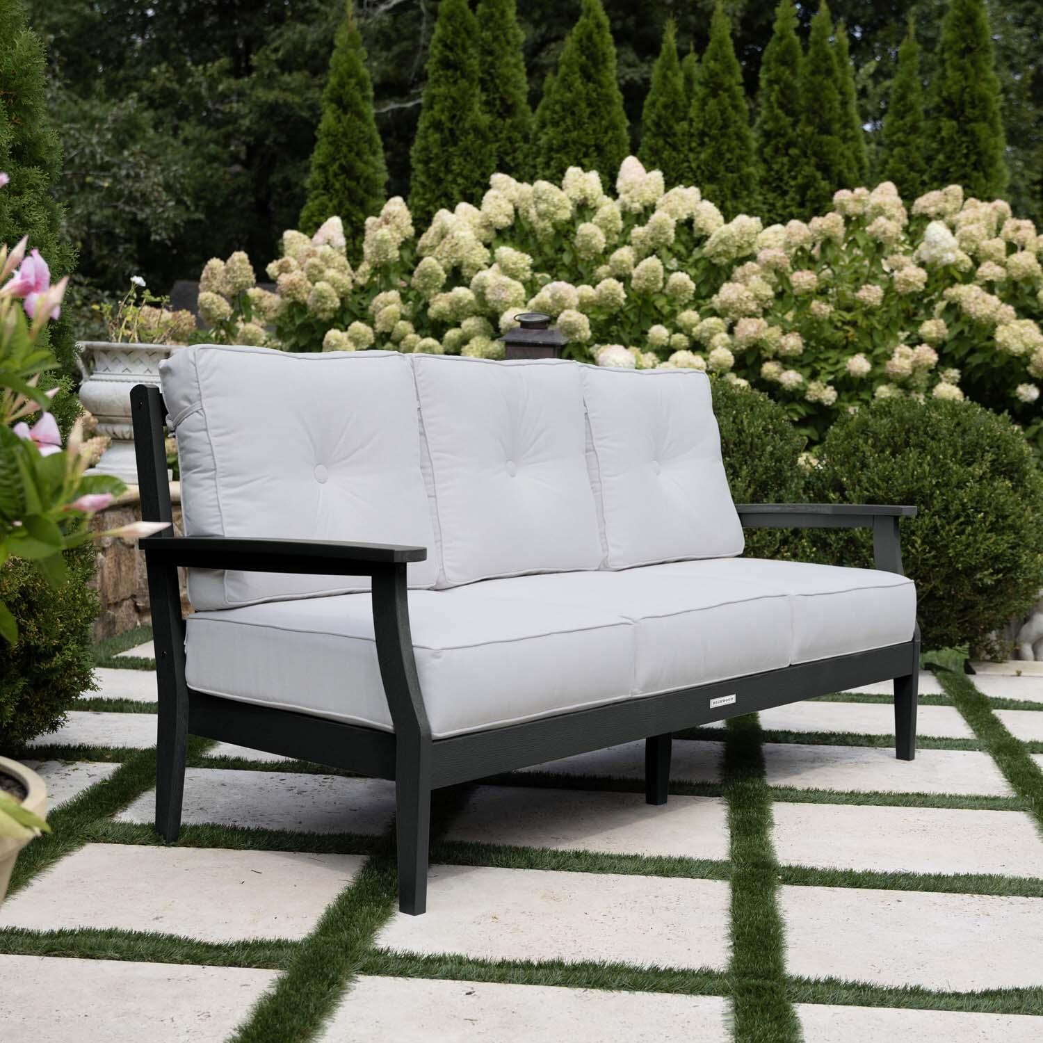 Blushing Bay 3 Person Recycled Plastic Sofa in Bliss Linen/Black by Lakeview Outdoor Designs - Side View - Lifestyle thumbnail