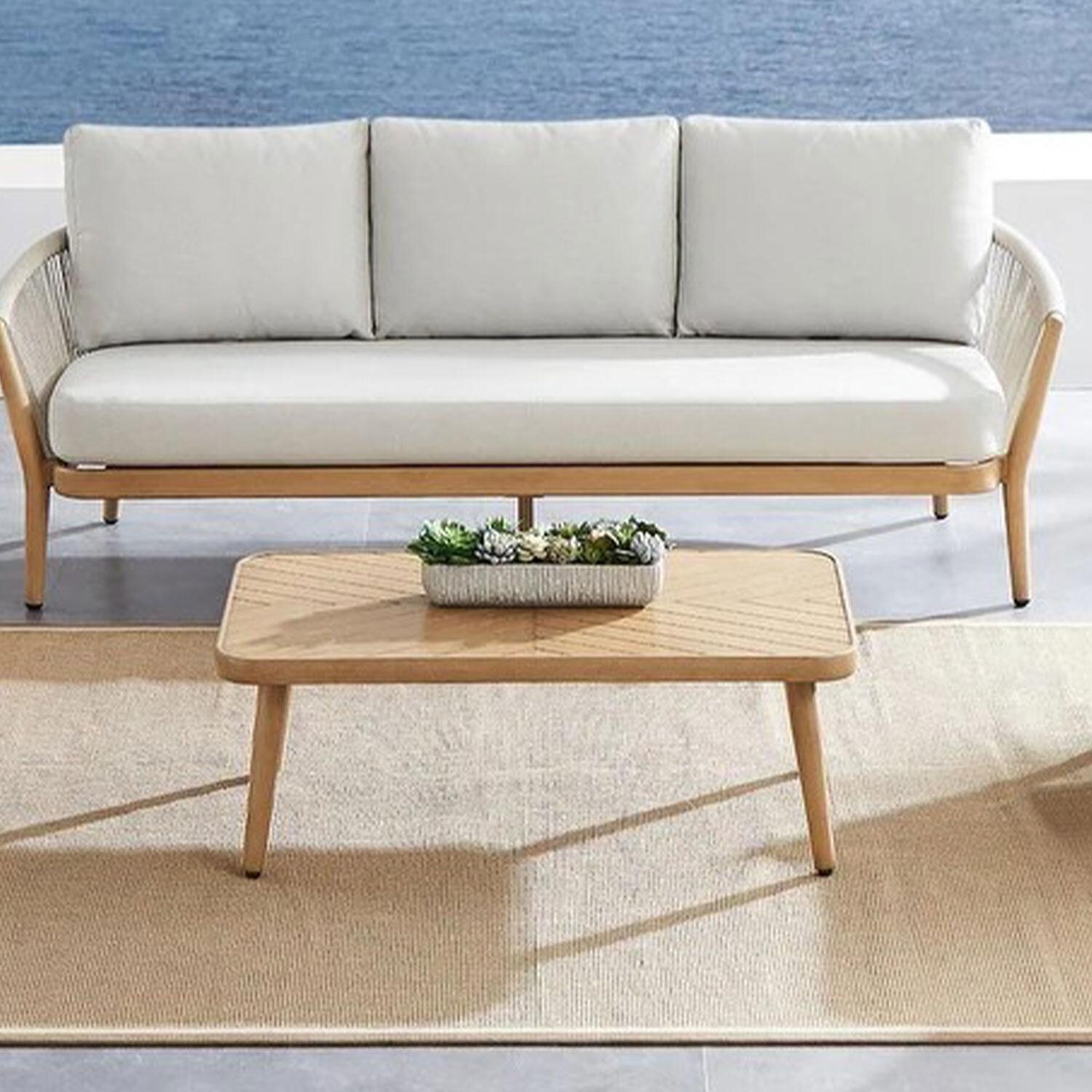 Camellia 41 Inch Teak Coffee Table by Lakeview Outdoor Designs - Beach View - Lifestyle thumbnail
