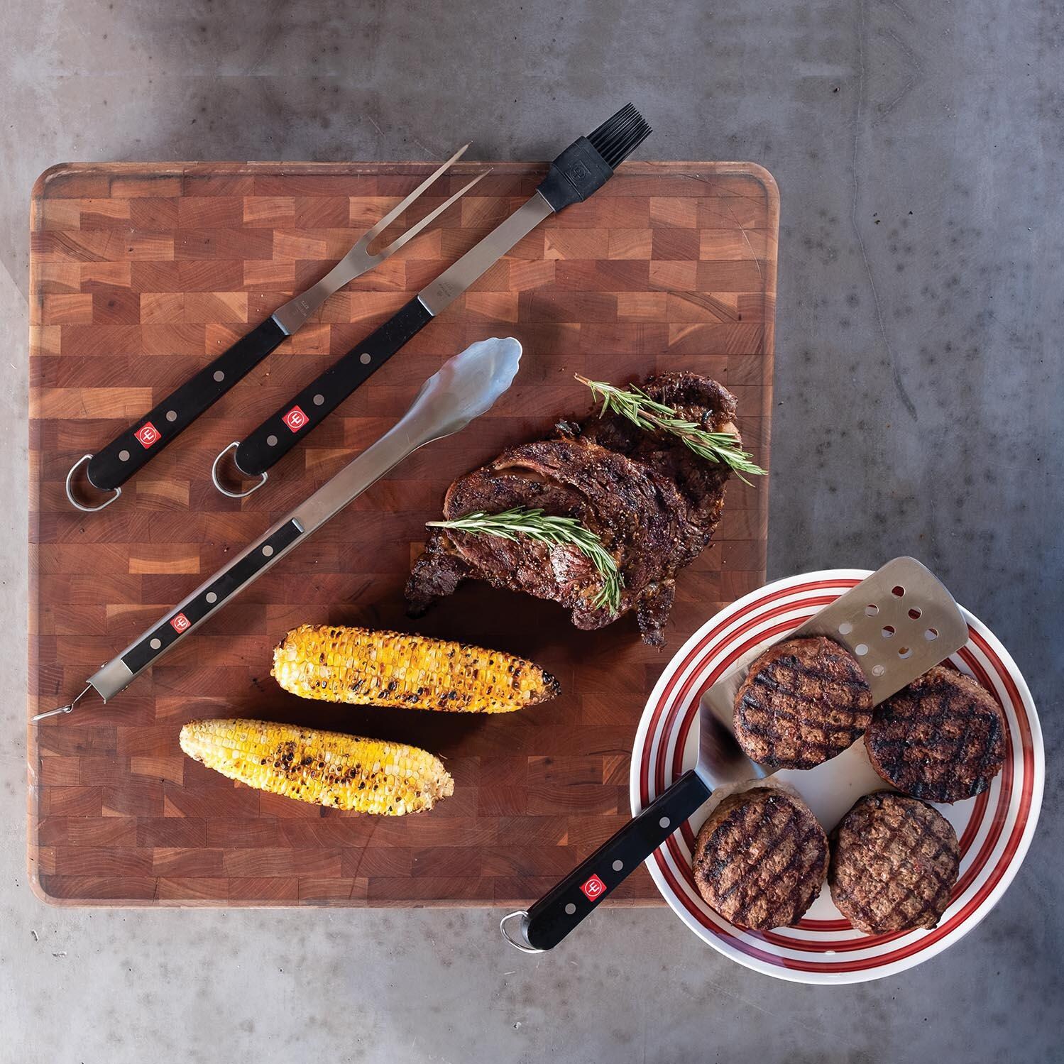 Wusthof 2804 Outdoor 4-Piece Stainless Steel BBQ Tool Set - Overhead Lifestyle View thumbnail