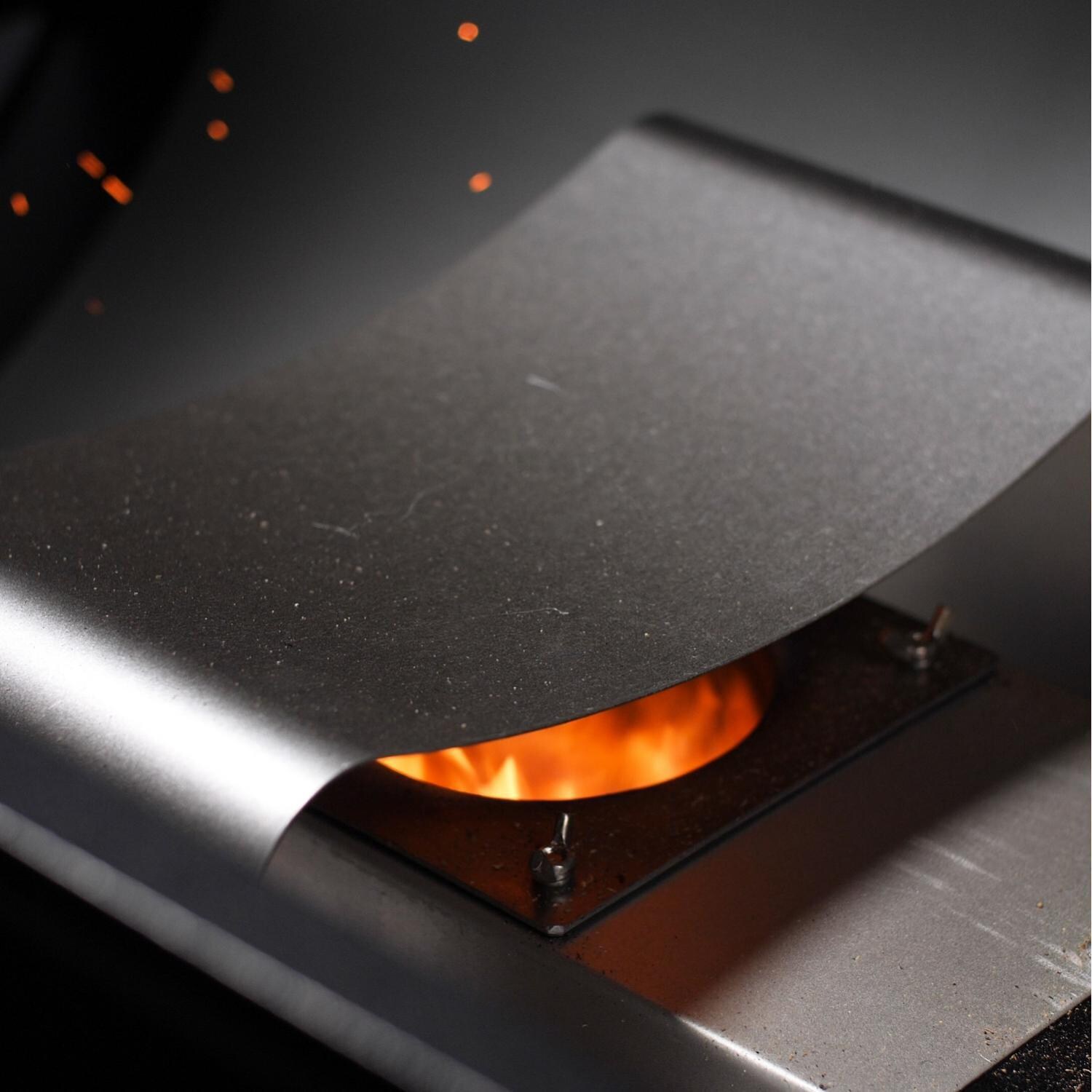 Traeger TFB89BLF Ironwood 885 Wood Pellet Grill - Fire Pot In Use thumbnail