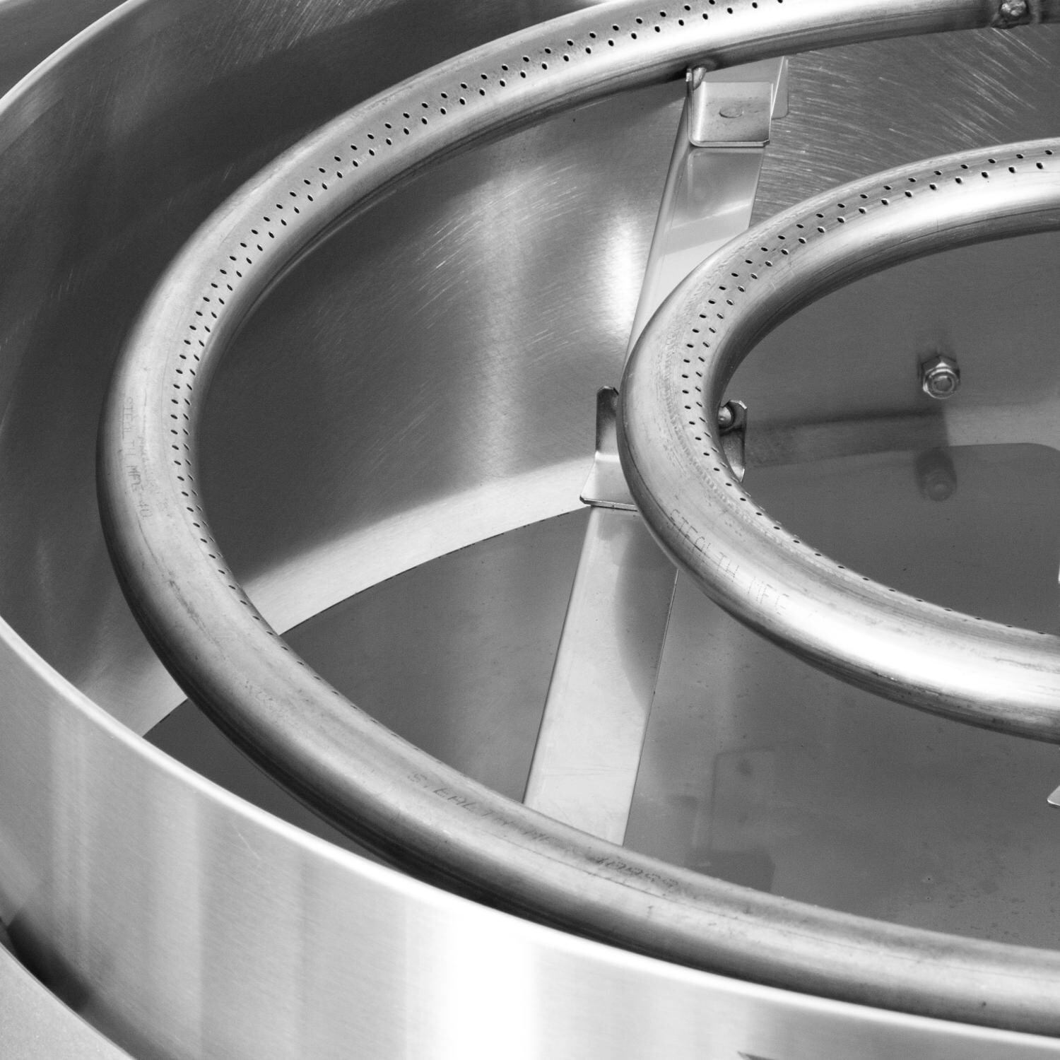 EVO 10-0002-LP Professional Wheeled Cart Flattop Propane Gas Grill w/ Non-Stick Ceramic Clad Coating - Burner Close Up - Detail thumbnail