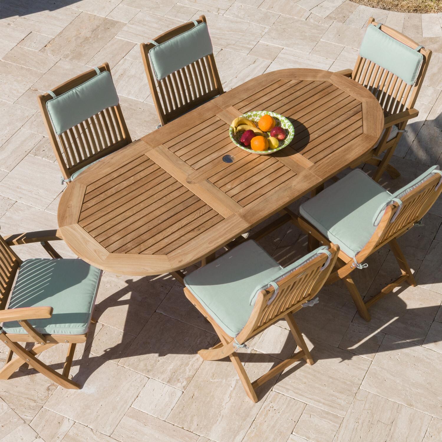 Royal Teak Collection Sailor 7 Piece Teak Patio Dining Set With 60 X 35 Inch Oval Extension Table And Sunbrella Canvas Spa Cushions thumbnail