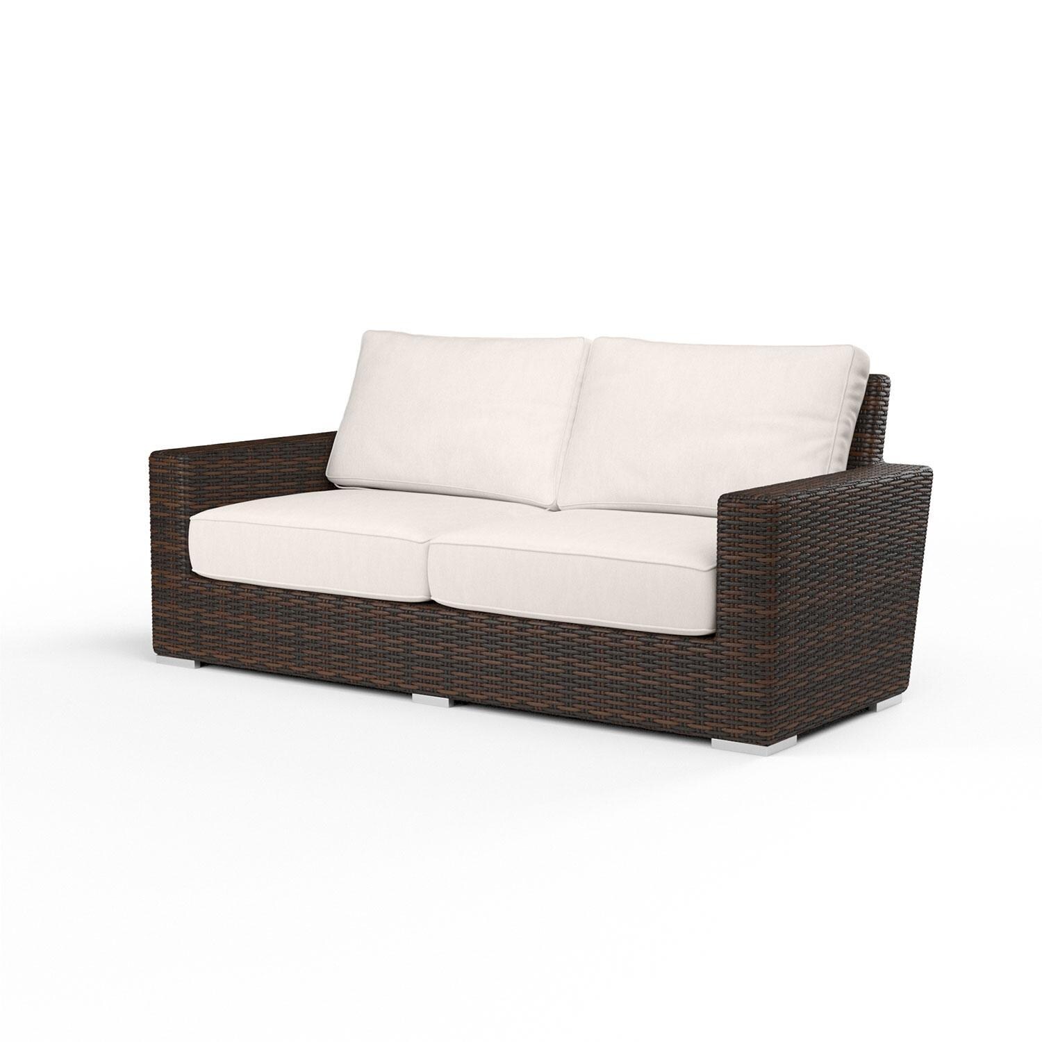 Montecito Wicker Patio Loveseat in Canvas Natural w/ Self Welt By Sunset West