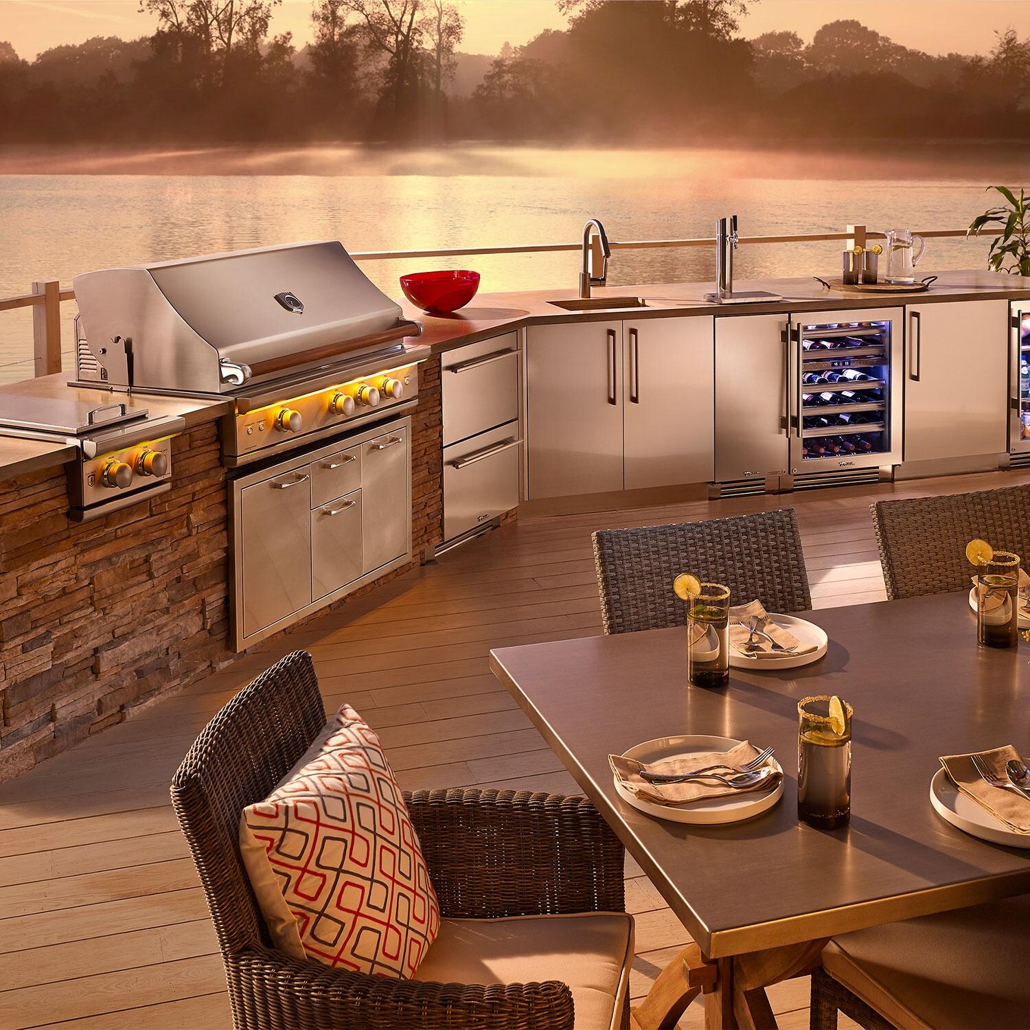 True TUI-15-L-OP-D~DSK-030-H04 15-Inch 85 Lb. Left Hinge Outdoor Ice Maker - Matte Black w/ Stainless Steel Handle - Complete Island Look - Lifestyle thumbnail