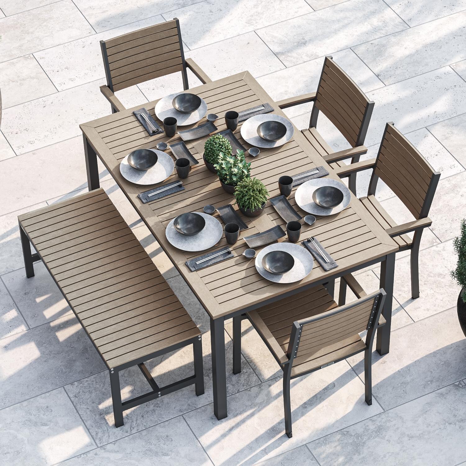 Oxford Garden Travira 63 X 40 Inch Rectangular Carbon Aluminum Dining Table W/ Vintage Tekwood Top - Shown W/ Dining Set - Lifestyle thumbnail