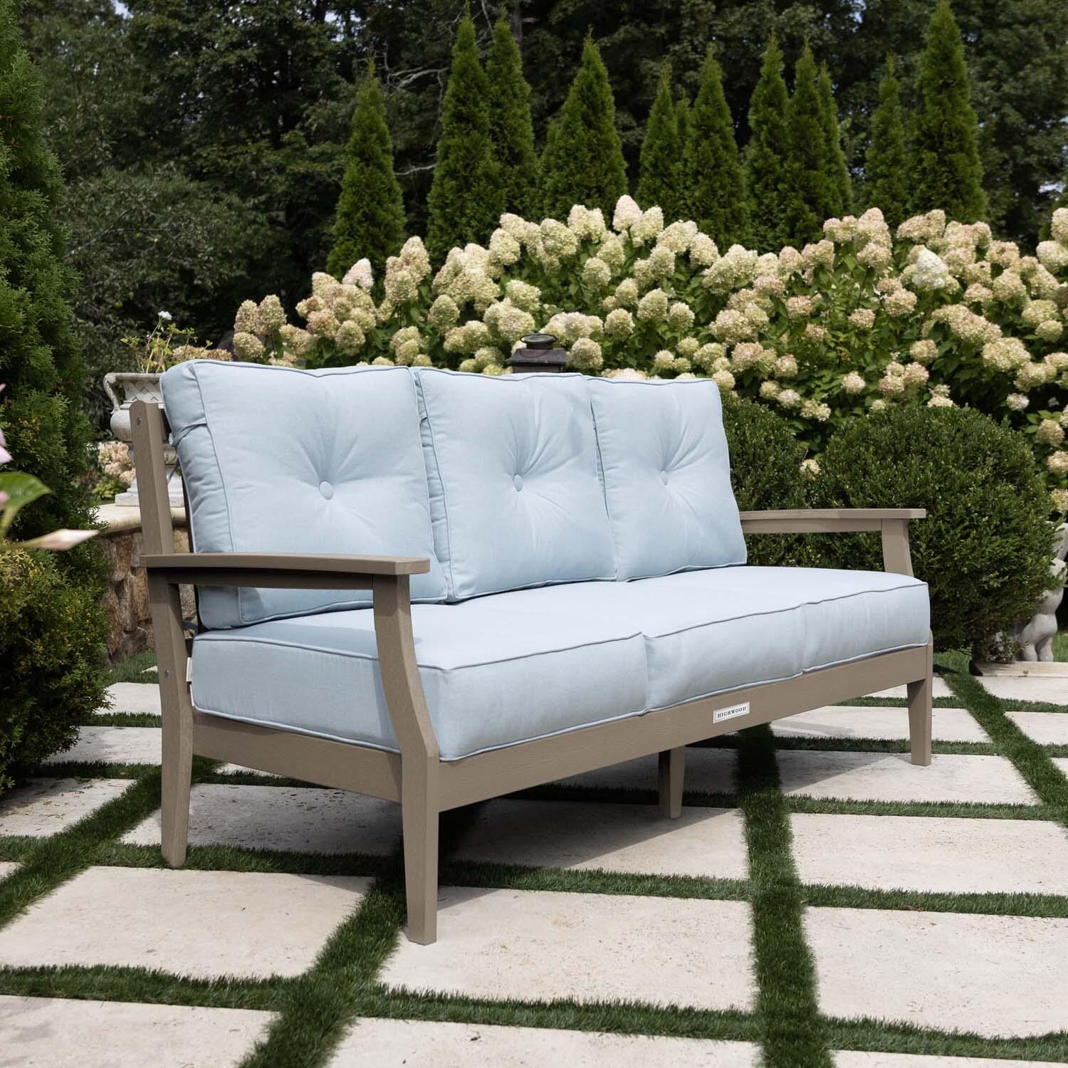 Blushing Bay 3 Person Recycled Plastic Sofa in Bliss Dew/Woodland Brown by Lakeview Outdoor Designs - Side View - Lifestyle thumbnail