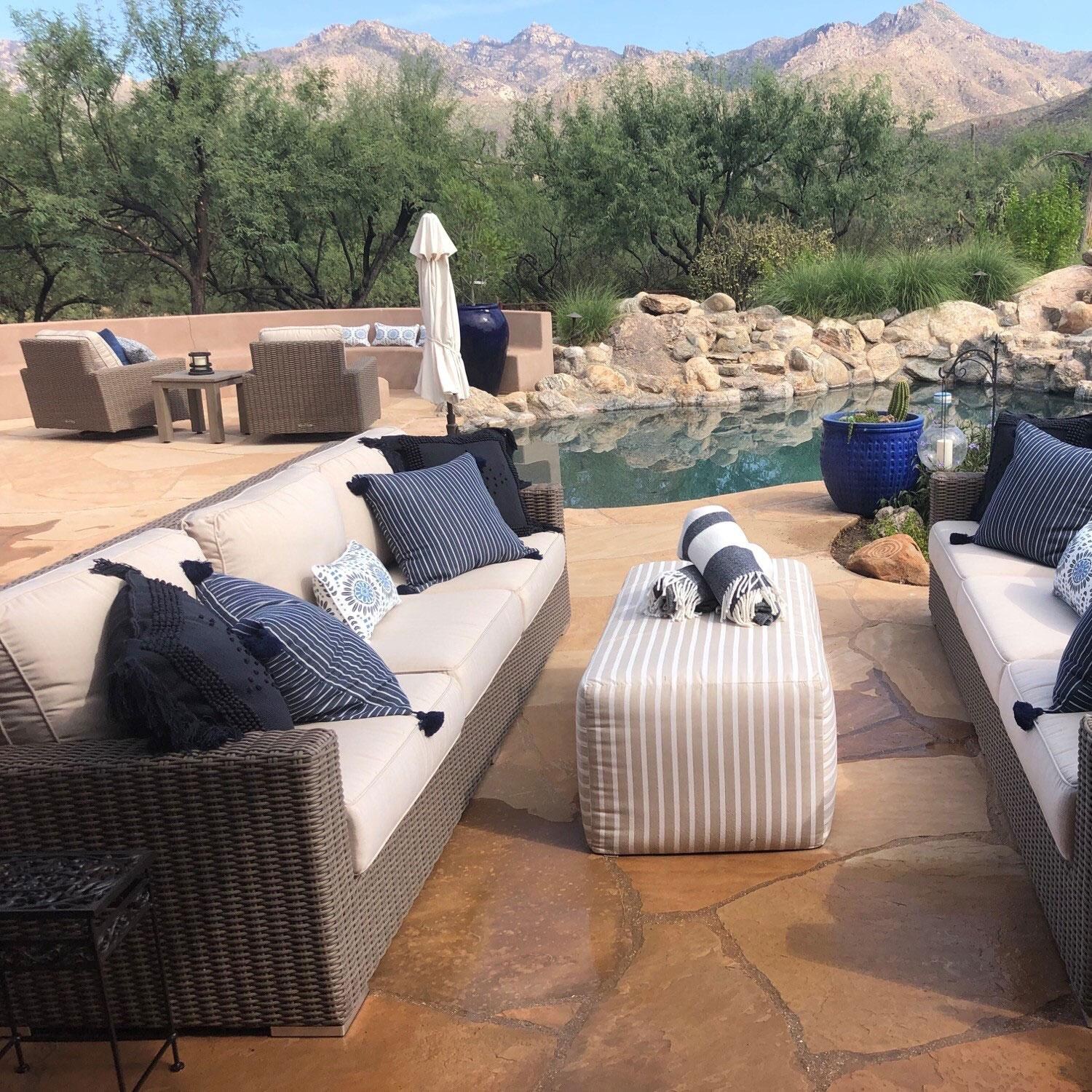 Coronado Wicker Patio Sofa W/ Sunbrella Canvas Flax Cushions By Sunset West - Side View - Lifestyle thumbnail