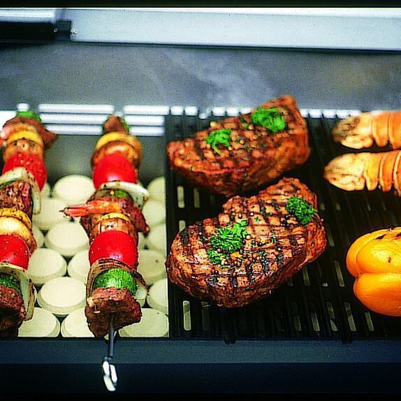 MHP WHRG4DD Freestanding Hybrid Gas Grill With SearMagic Grids - Food on SearMagic Grid